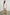 Miley Cropped, Short-Sleeve, V Neck Top with Flutter Sleeves and Textured Fabric in White Colorway - Front Full Body View Featured on Model
