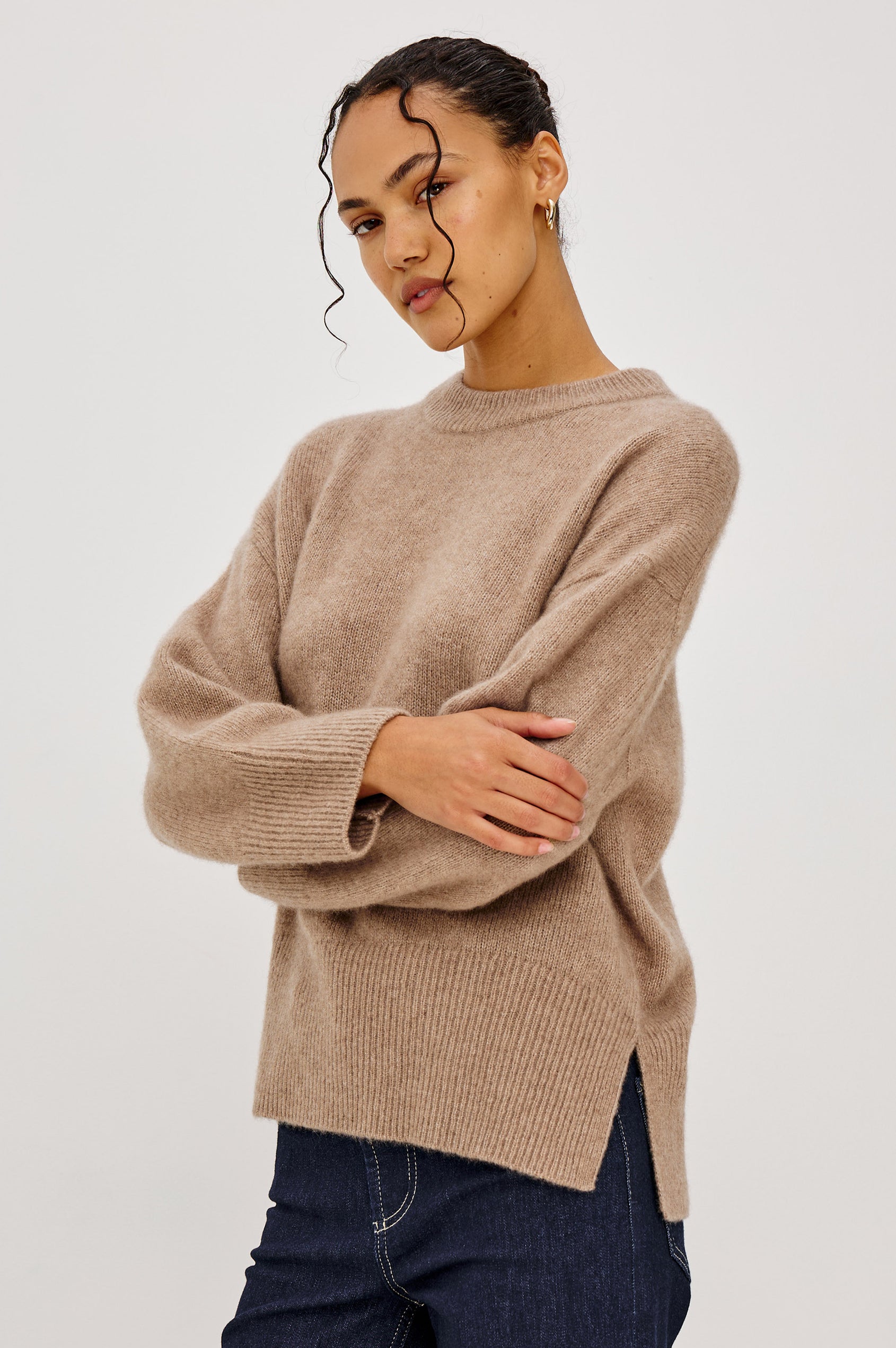 Miranda Sweater in Cashmere-Silk Blend With Relaxed Boxy Fit, Mock Neck, Drop Shoulders, and Side Slits at Hem in Oatmeal Colorway - Upper Body Front View Featured on Model
