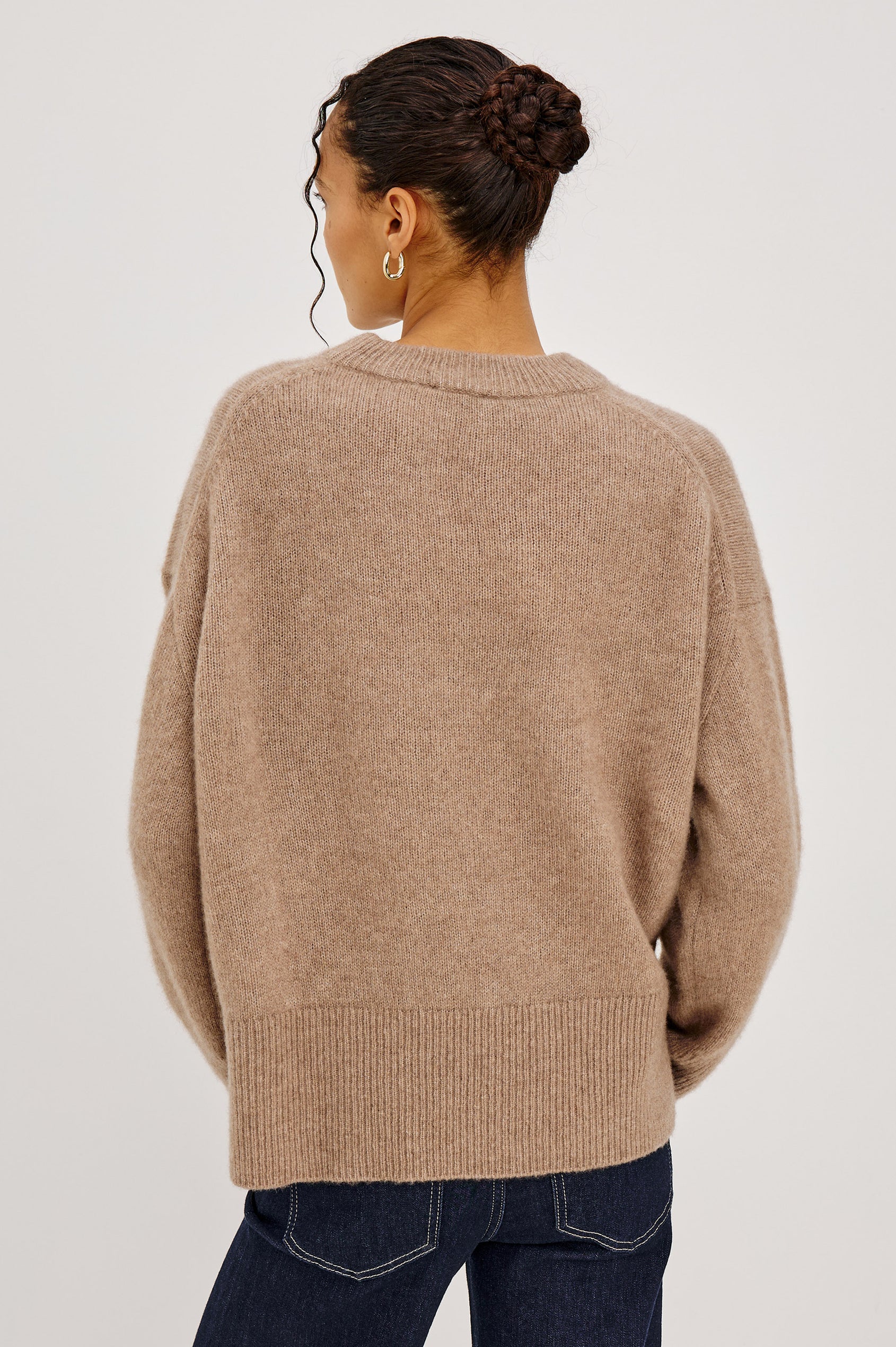 Miranda Sweater in Cashmere-Silk Blend With Relaxed Boxy Fit, Mock Neck, Drop Shoulders, and Side Slits at Hem in Oatmeal Colorway - Upper Body Back View Featured on Model