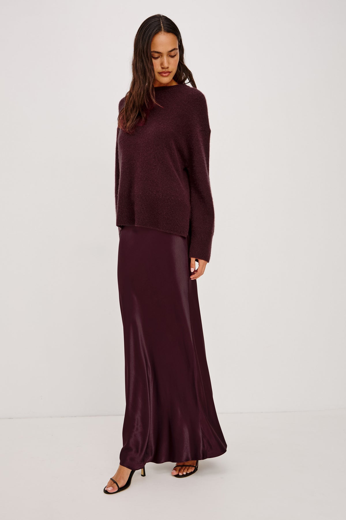 Miranda Sweater in Cashmere-Silk Blend With Relaxed Boxy Fit, Mock Neck, Drop Shoulders, and Side Slits at Hem in Wine Colorway - Front Full Body View Featured on Model