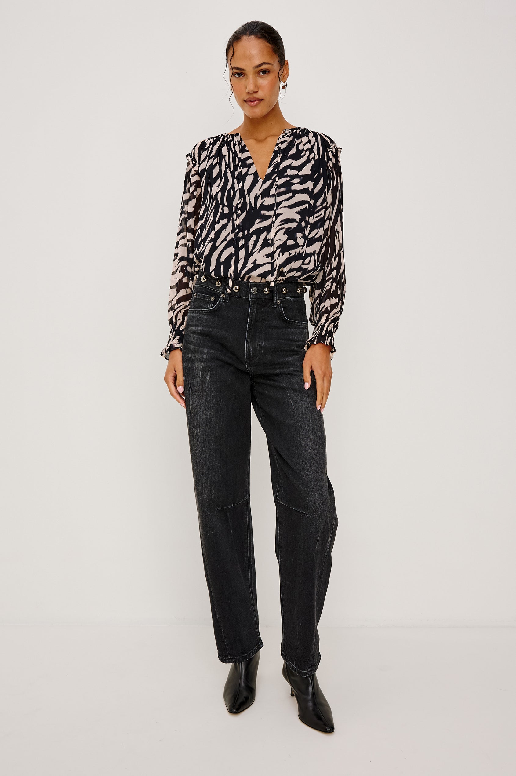 Mirna Blouse in Chiffon With Self-Tie V-Neckline, Loose Boxy Fit, Ruffle Trim, Balloon Sleeves with Smocked Cuffs in Ivory Tiger Stripe Colorway - Full Body Front View Featured on Model