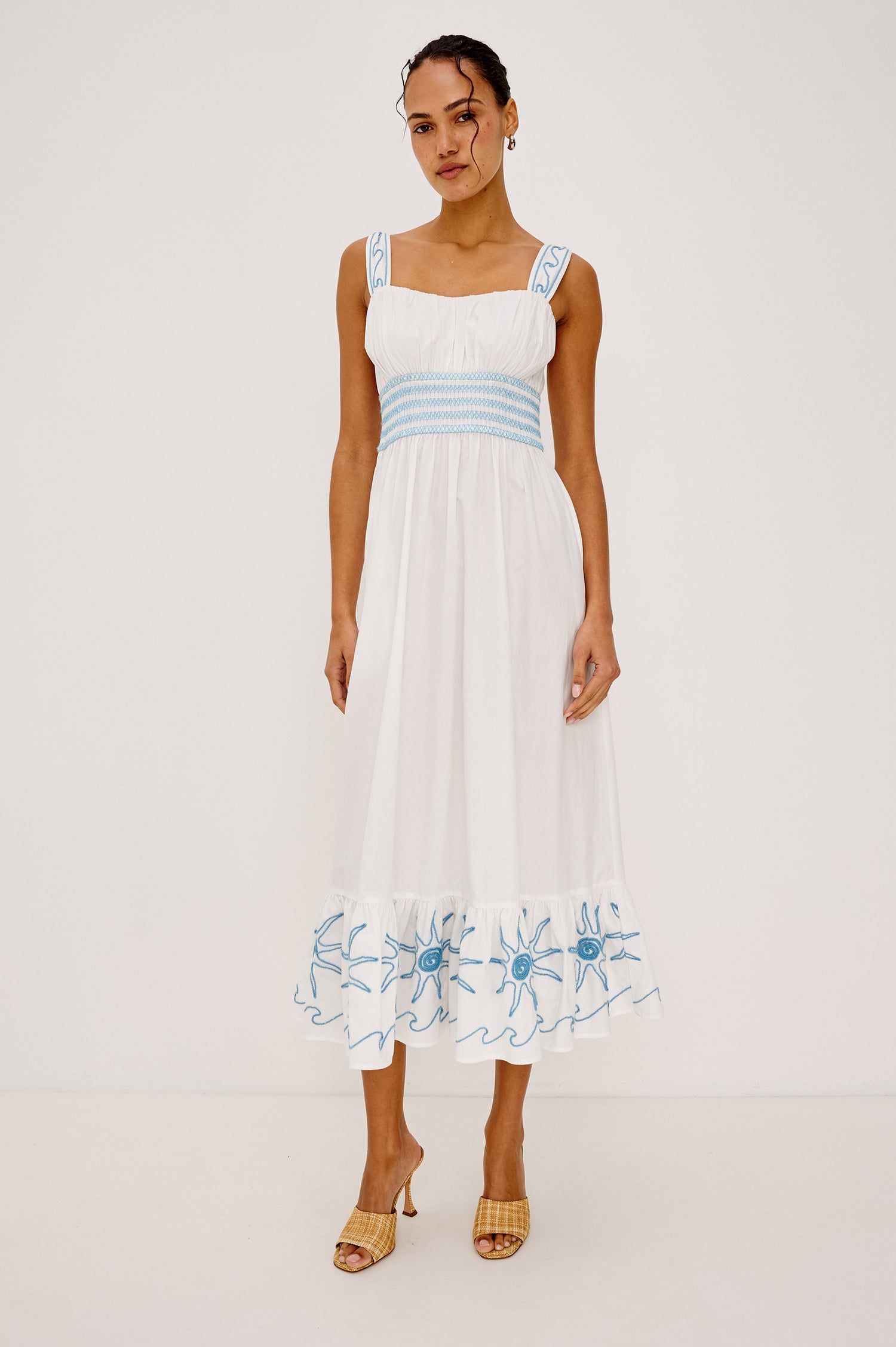 Moira Midi Dress in Cotton Poplin With Ruched Sweetheart Bust, Wide Shoulder Straps, Smocked Waist, and Contrast Stitch Embroidery in Blue Soutache Suns Colorway - Upper Body Front View Featured on Model