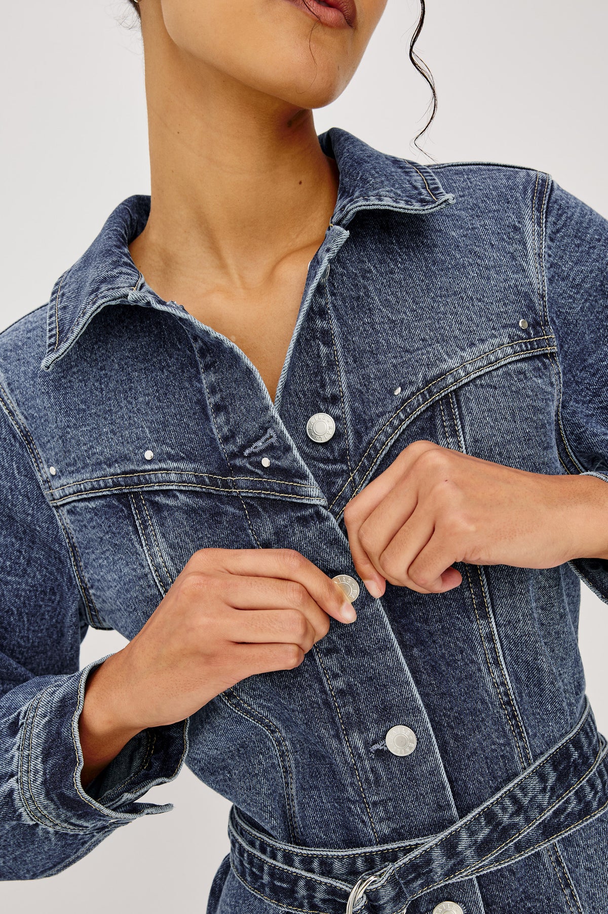 Montant Mini Dress in Comfort-Stretch Denim With Studded Front Yoke, Button-Front, Long Sleeves, and Double Belt in Blue Bonnet Colorway - Upper Body Close Up View Featured on Model