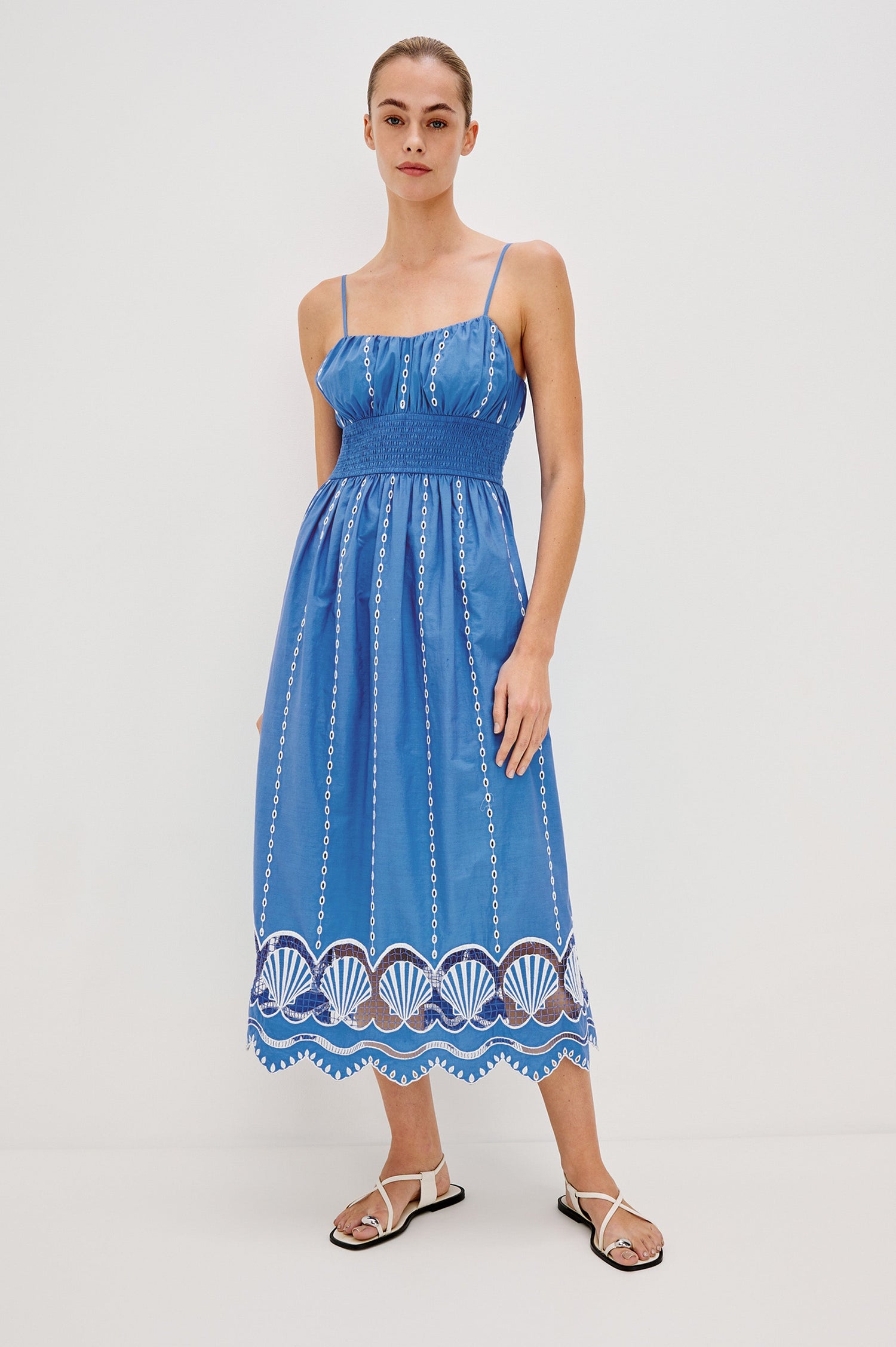 Murano Midi Tank Dress with Spaghetti Straps, Gathered Elastic Waistband, Sea Shell Embroidery and Scalloped Hem in French Blue Colorway. Full Body Front View Shown on Model.