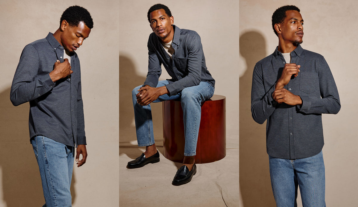 A three-panel studio fashion photo of a man wearing a dark blue-gray long-sleeve button-up shirt with light blue jeans. In the left panel, he stands and adjusts the shirt collar.