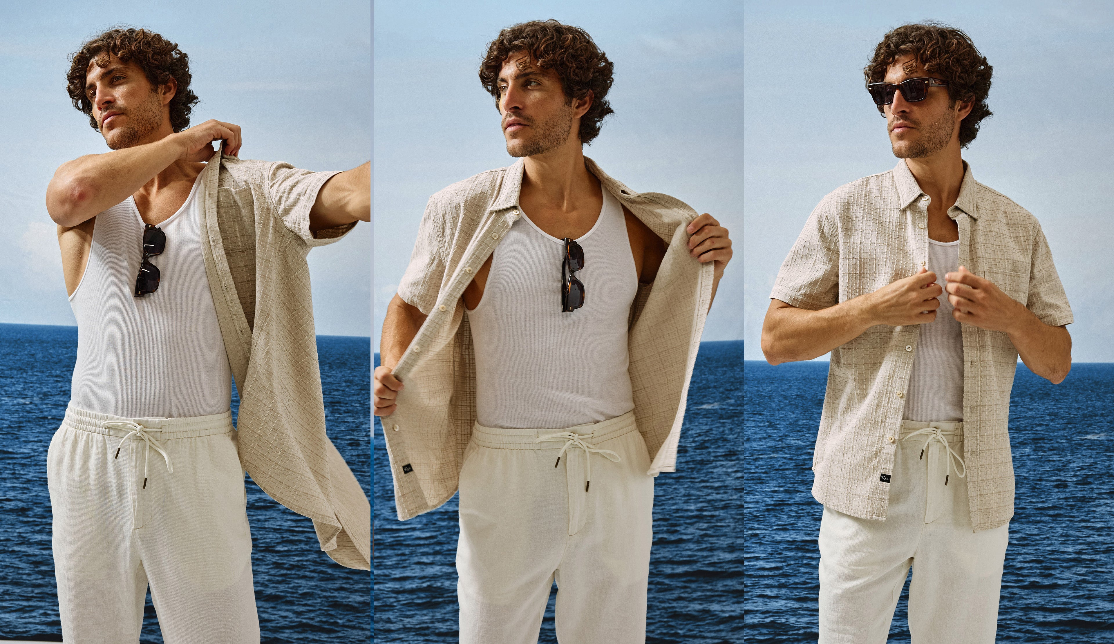 Man in casual outfit with sunglasses against a blue ocean background