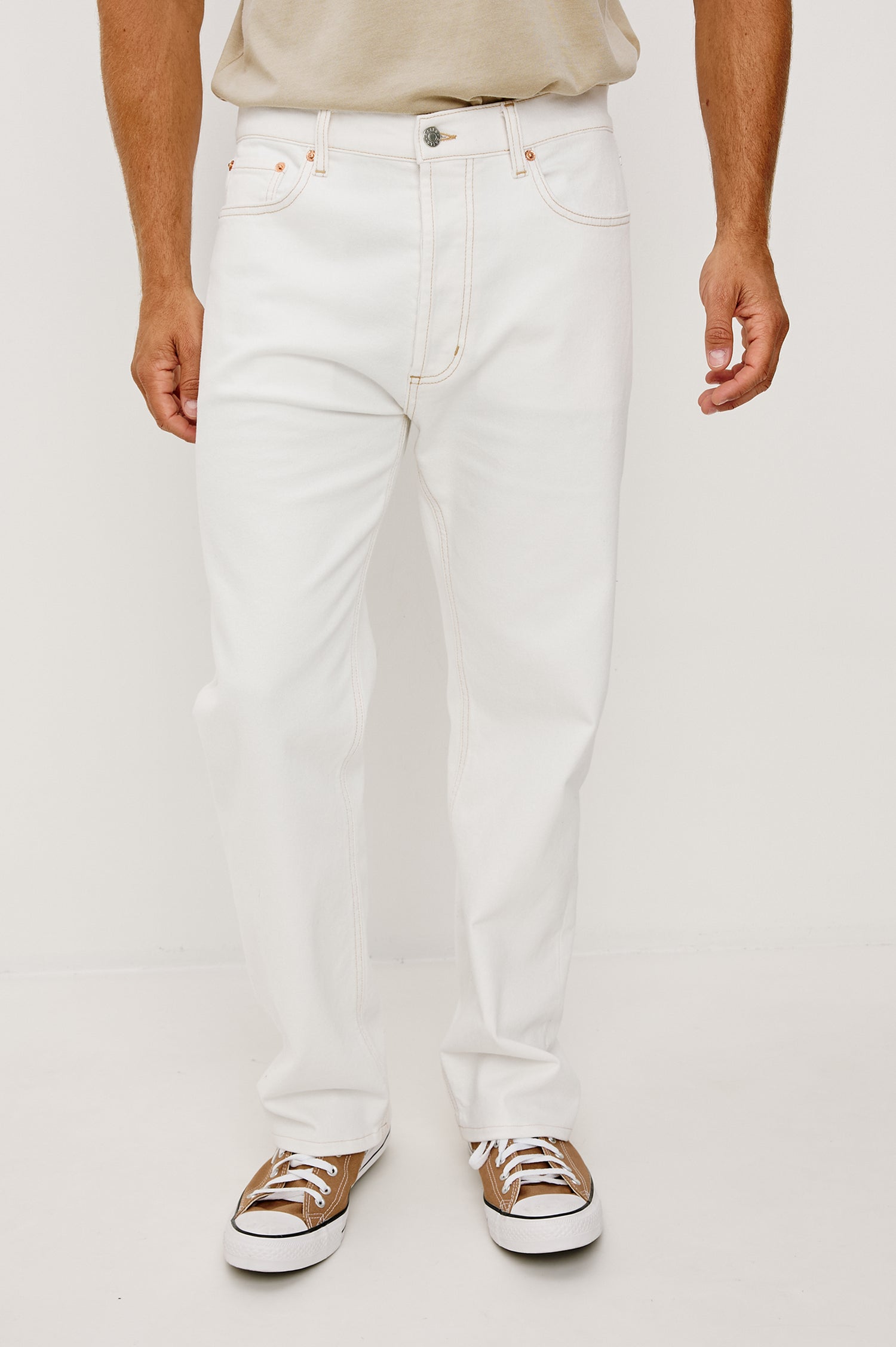 Nash Straight Leg Jean in Stretch Cotton With Classic 5-Pockets, Belt Loops, and a Front Zip Fly in Ecru Colorway - Lower Body Front View Featured on Model