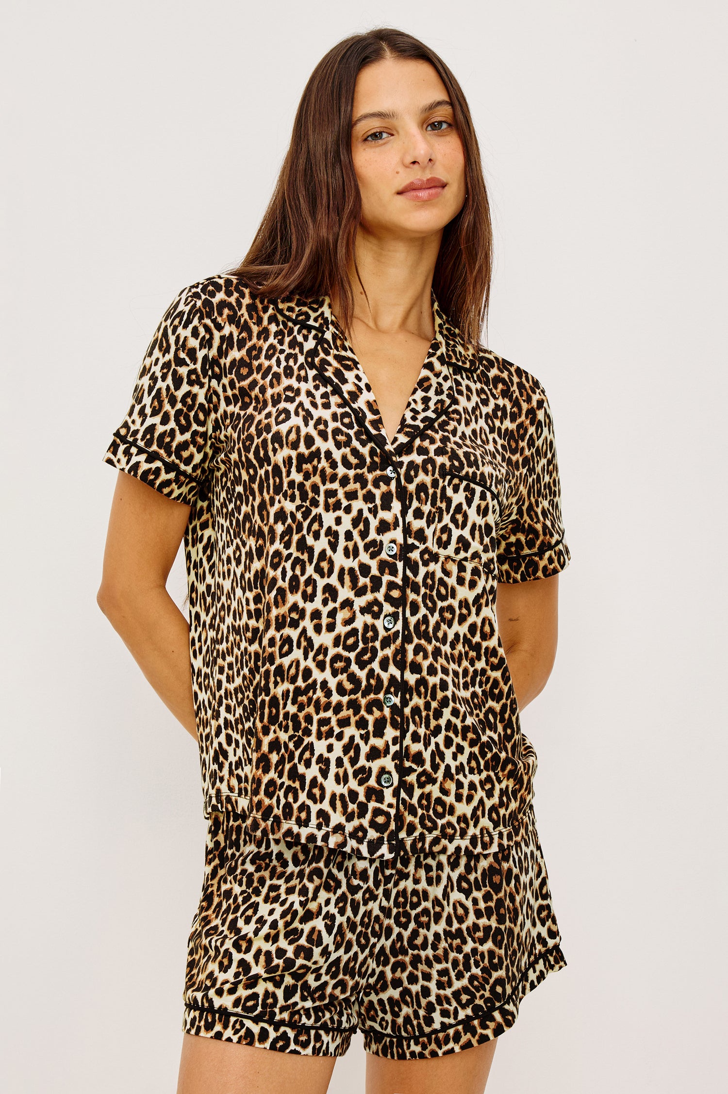 Nessa Pajama Set in Signature Rayon With Animal Print, Relaxed Short Sleeve Button-Up Shirt With Notched Collar, and Chest Patch Pocket and High-Waisted Shorts With Adjustable Drawstring Ties in Nala Colorway - Upper Body Front View Featured on Model