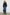 North Cropped Jacket with Button Closure, Puff Sleeves, Oversize Collar, a Toggle Hem, Two Front Pockets and a Horizontal Back Vent in Black Twill Colorway - Front Full Body View Featured on Model