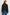 North Cropped Jacket with Button Closure, Puff Sleeves, Oversize Collar, a Toggle Hem, Two Front Pockets and a Horizontal Back Vent in Black Twill Colorway - Back View Featured on Model