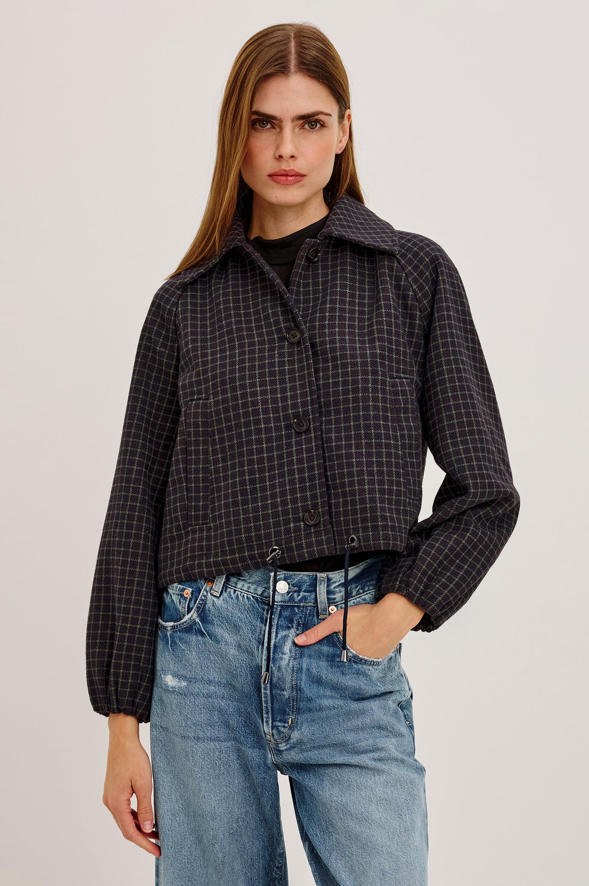 North Jacket in Wool Blend With Cropped, Boxy Fit, Drawcord Hem, Oversized Collar, Front Buttons, and Welt Pockets in Mulberry Check Colorway - Upper Body Front View Featured on Model.