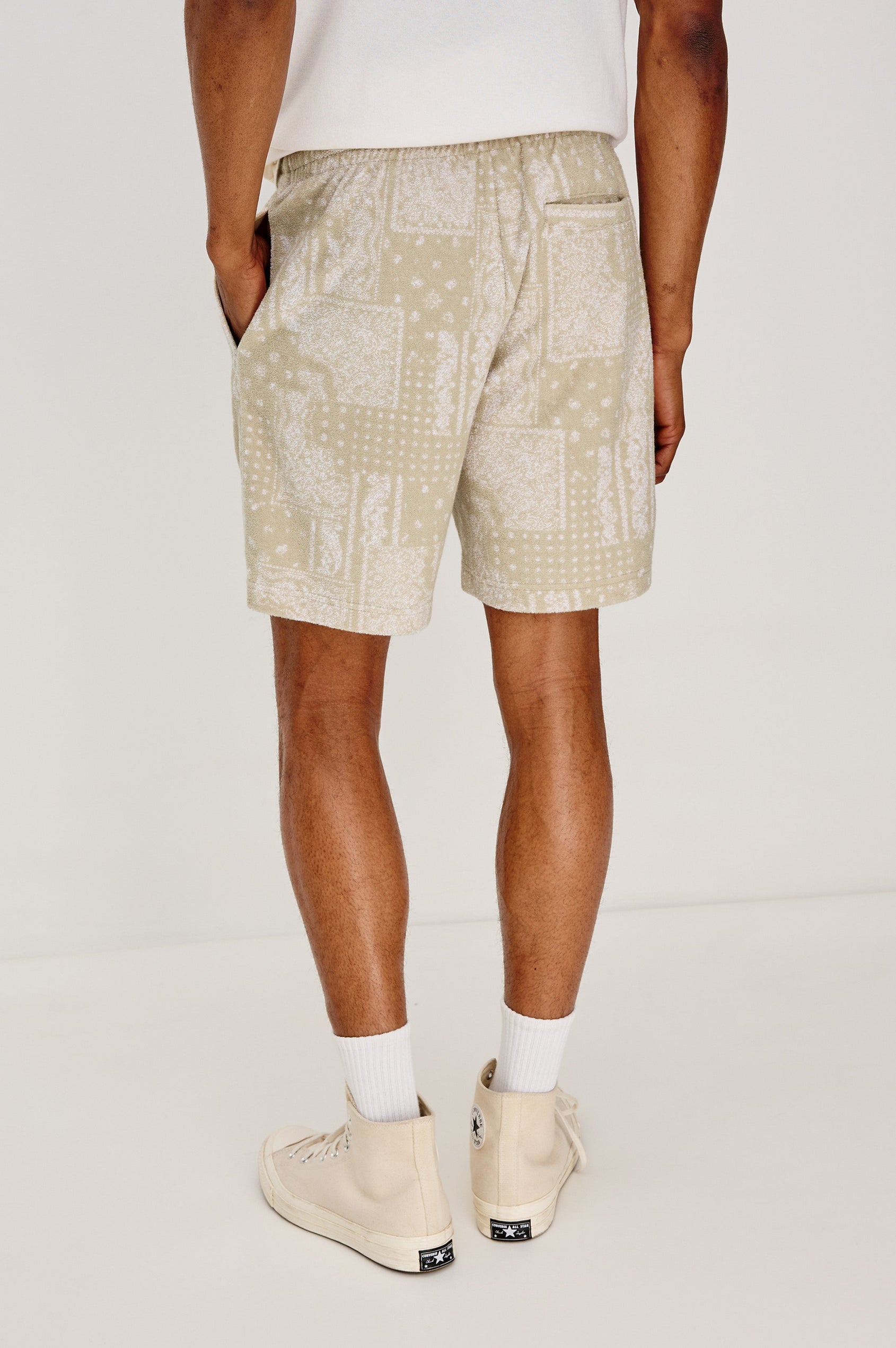 Nova Pull on Short with Drawstring and Elastic Waistband, back pocket and side pockets in Bandana Craft Paper Colorway. Back View Shown on Model.