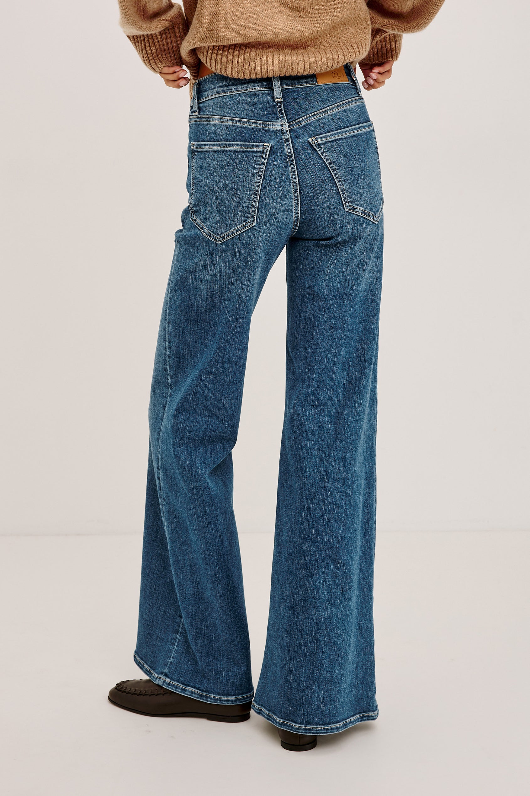 Olivos Palazzo Jean in Super Stretch Denim With High-Rise, Wide Legs, 5-Pockets, and Zip Fly in Lagoon Colorway - Lower Body Back View Featured on Model