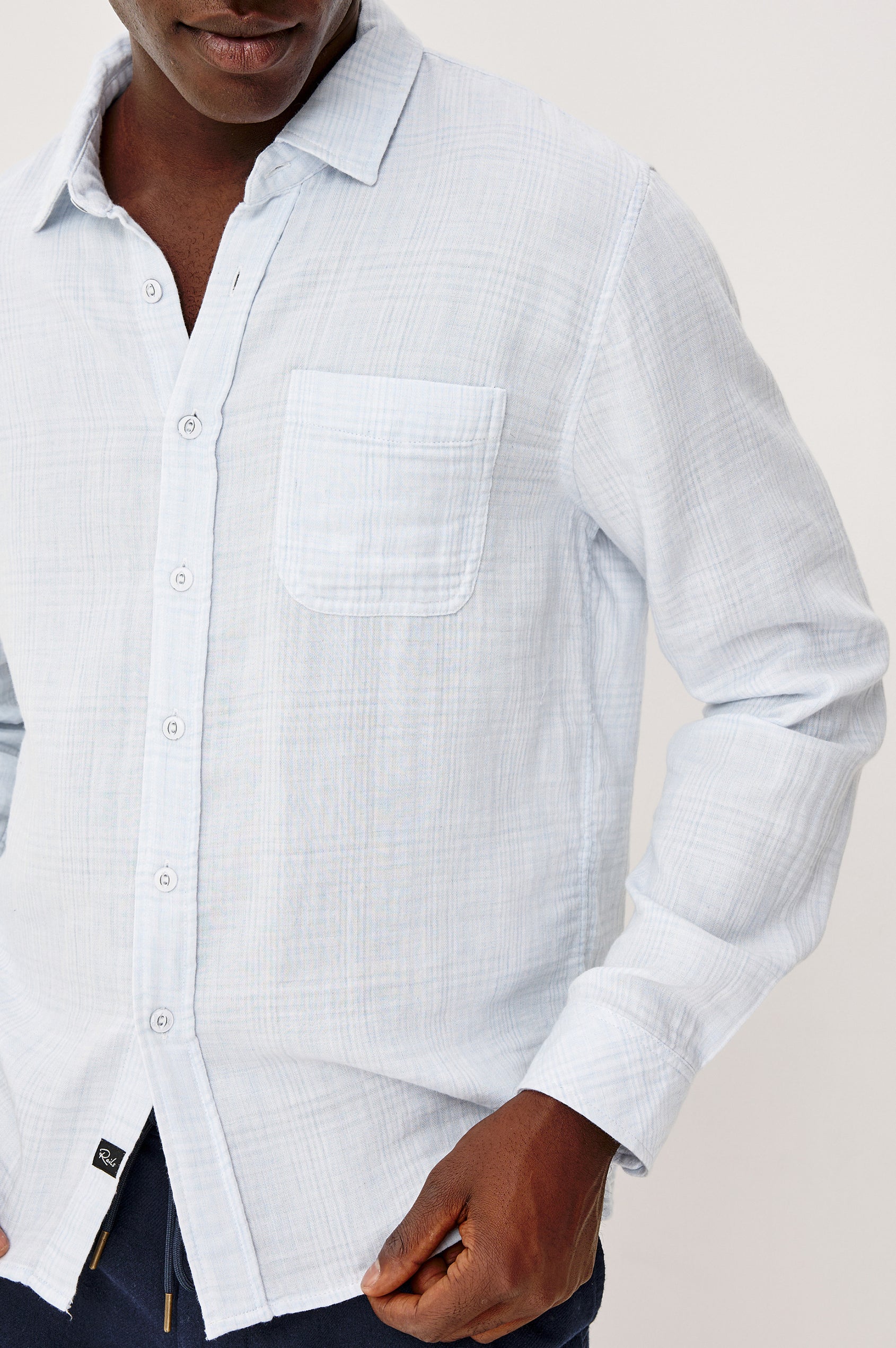 Owens Button-Up Shirt in Lightweight Cotton With Subtle Texture, Collar, Long Sleeves, and Chest Patch Pocket in Coastal Mist Colorway - Upper Body Front Detail View Featured on Model