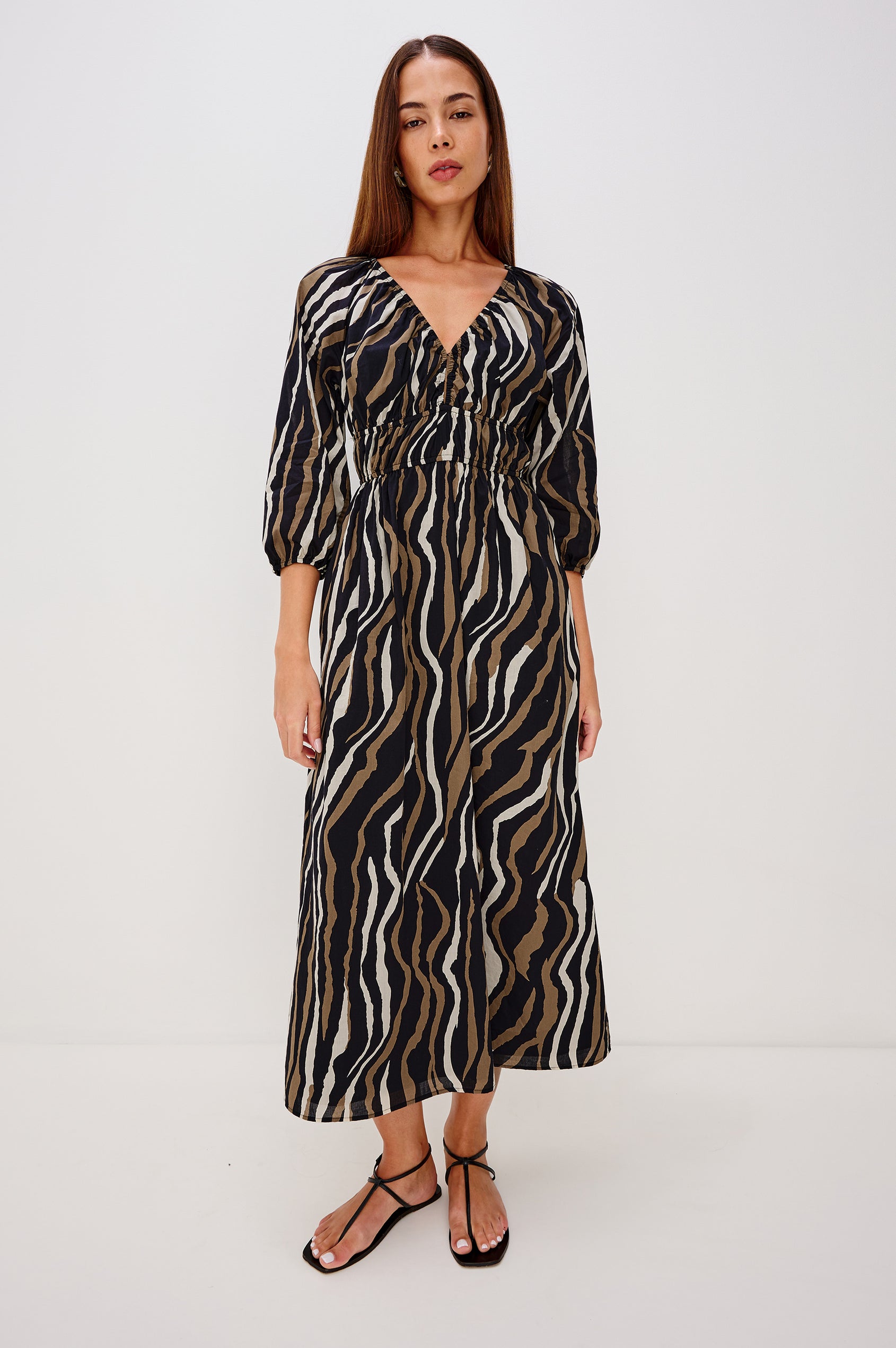 Paio Maxi Dress in Beach Cotton With Absract Print, V-neckline, Front Keyhole Cutout, Long Sleevees With Fitted Cuffs, and Three-Quarter in Canyon Stripe Colorway - Full Body Front View Meatured on Model