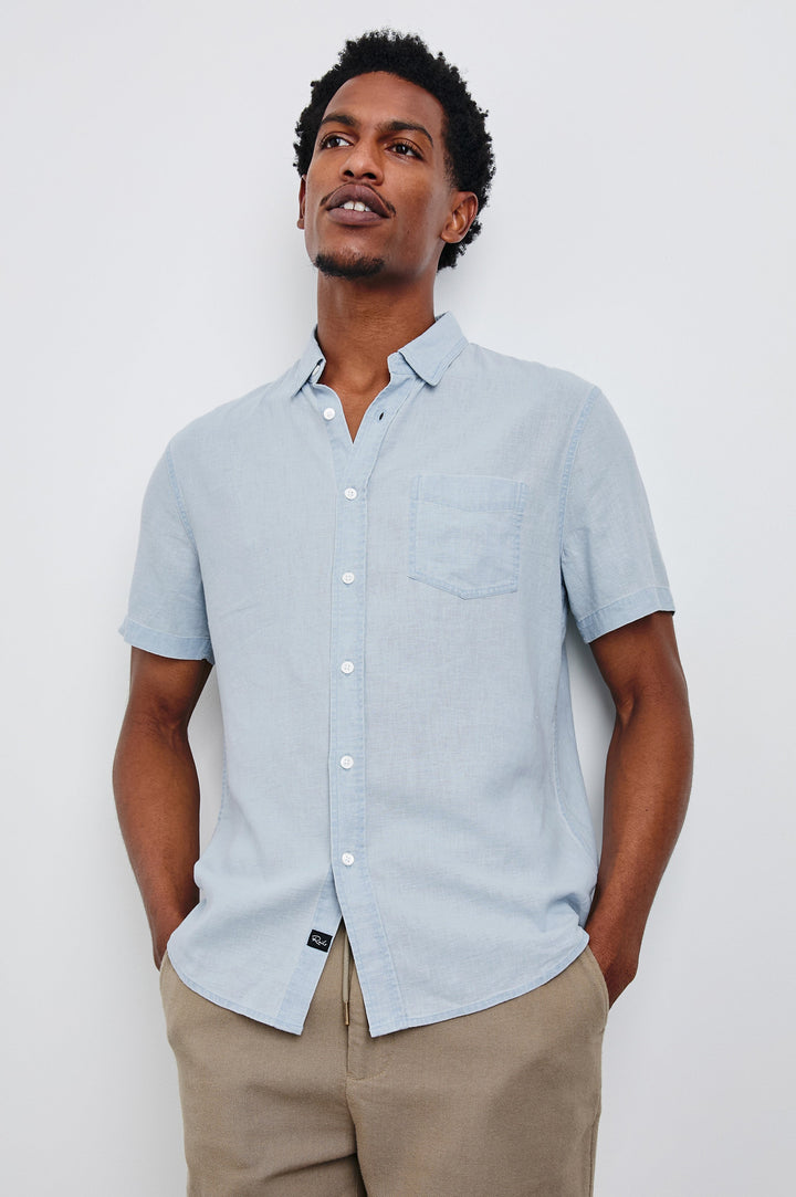 Paros button up short sleeve with front chest pocket in Blue Lagoon - front view on model