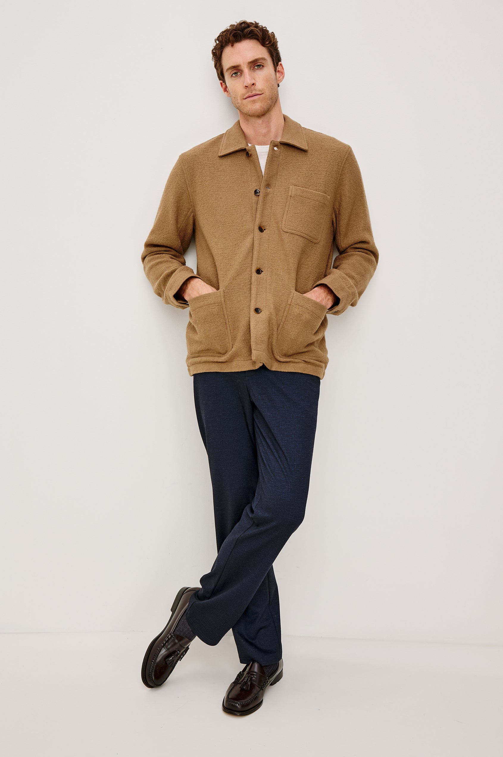 The Pascal is a collared button front jacket with front patch pockets and a chest pocket in Light Brown Boucle colorway. Front full body view featured on model.