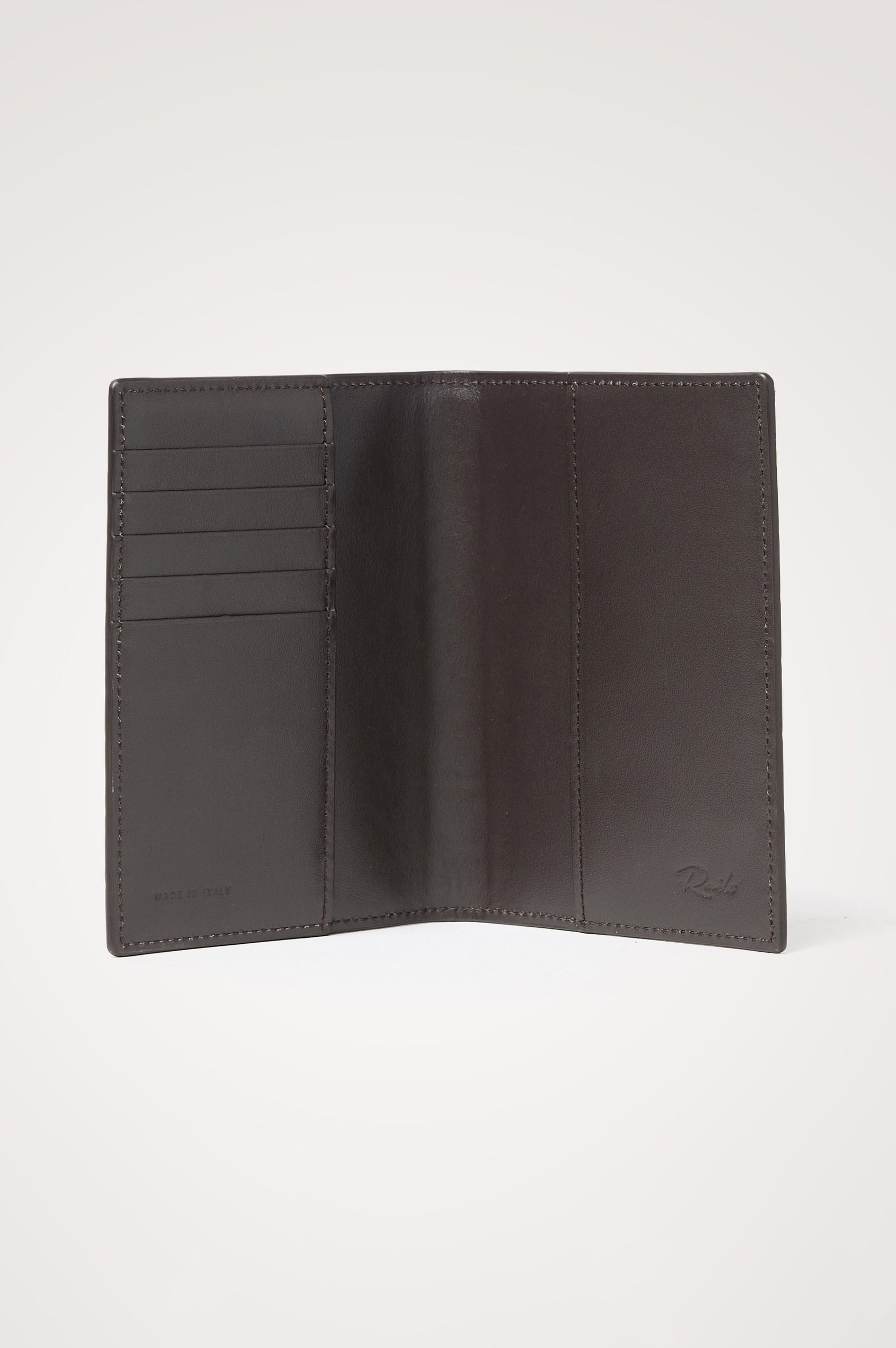 Passport Holder in Croc-Embossed Spanish Leather With Five Card Slots, Two Side Pockets, and Embossed Rails Logo in Dark Brown Croc Embossed Colorway - Interior view.