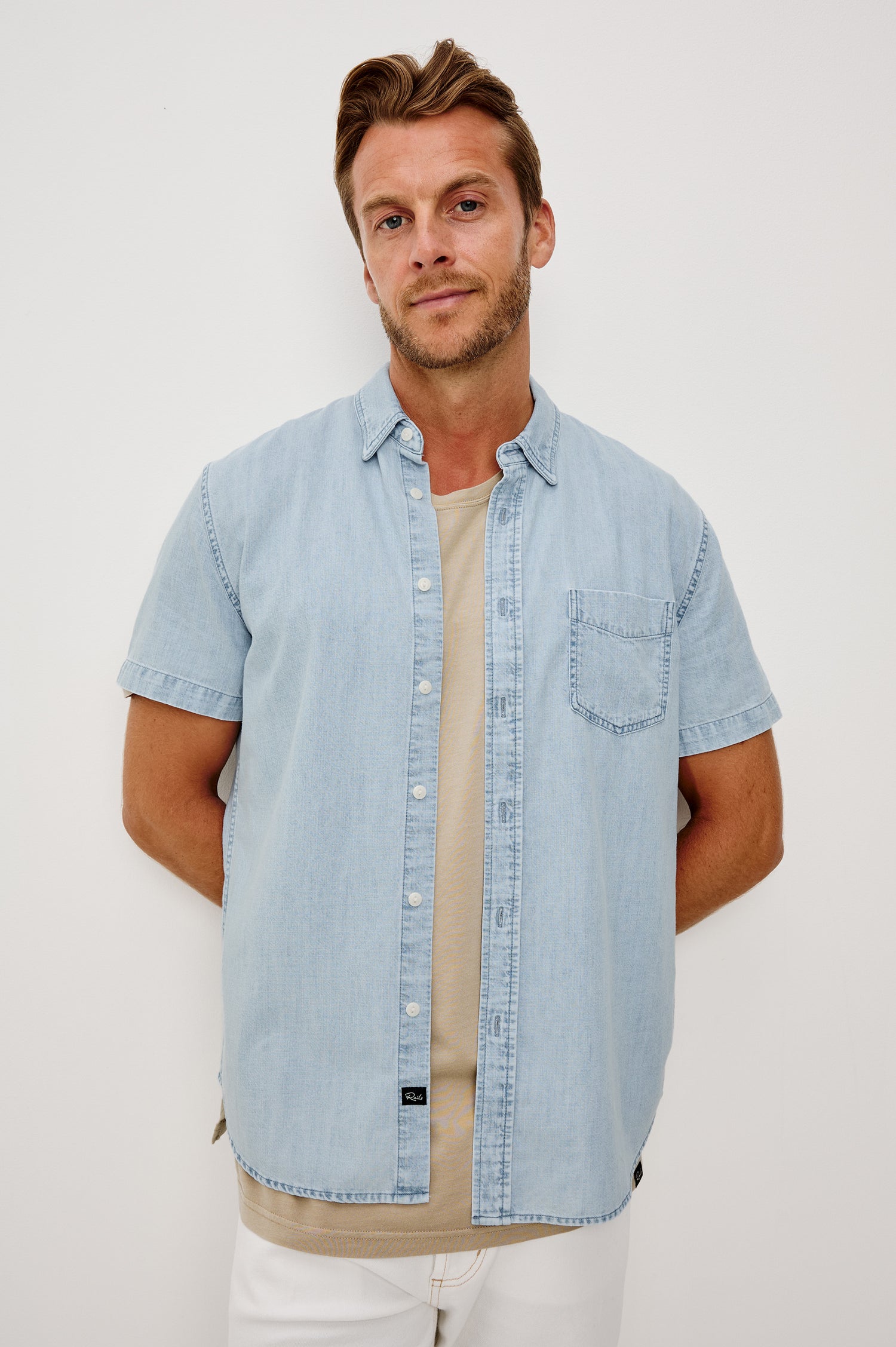 Penn Button-Up Shirt in Rope-Dye Yarn With Collar, Short Sleeves, and Classic Fit in Light Vintage Wash Colorway - Upper Body Front View Featured on Model