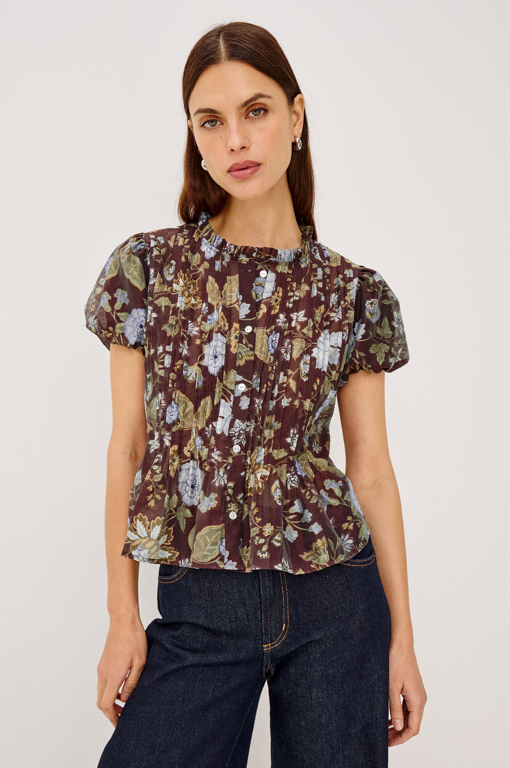 Pepper Shirt in Cotton Poplin With Loose Boxy Fit, Pintuck Detailing, Puff Cap Sleeves, Center-Front Buttons, and Soft Peplum Hem in Willow Colorway - Upper Body Front View Featured on Model