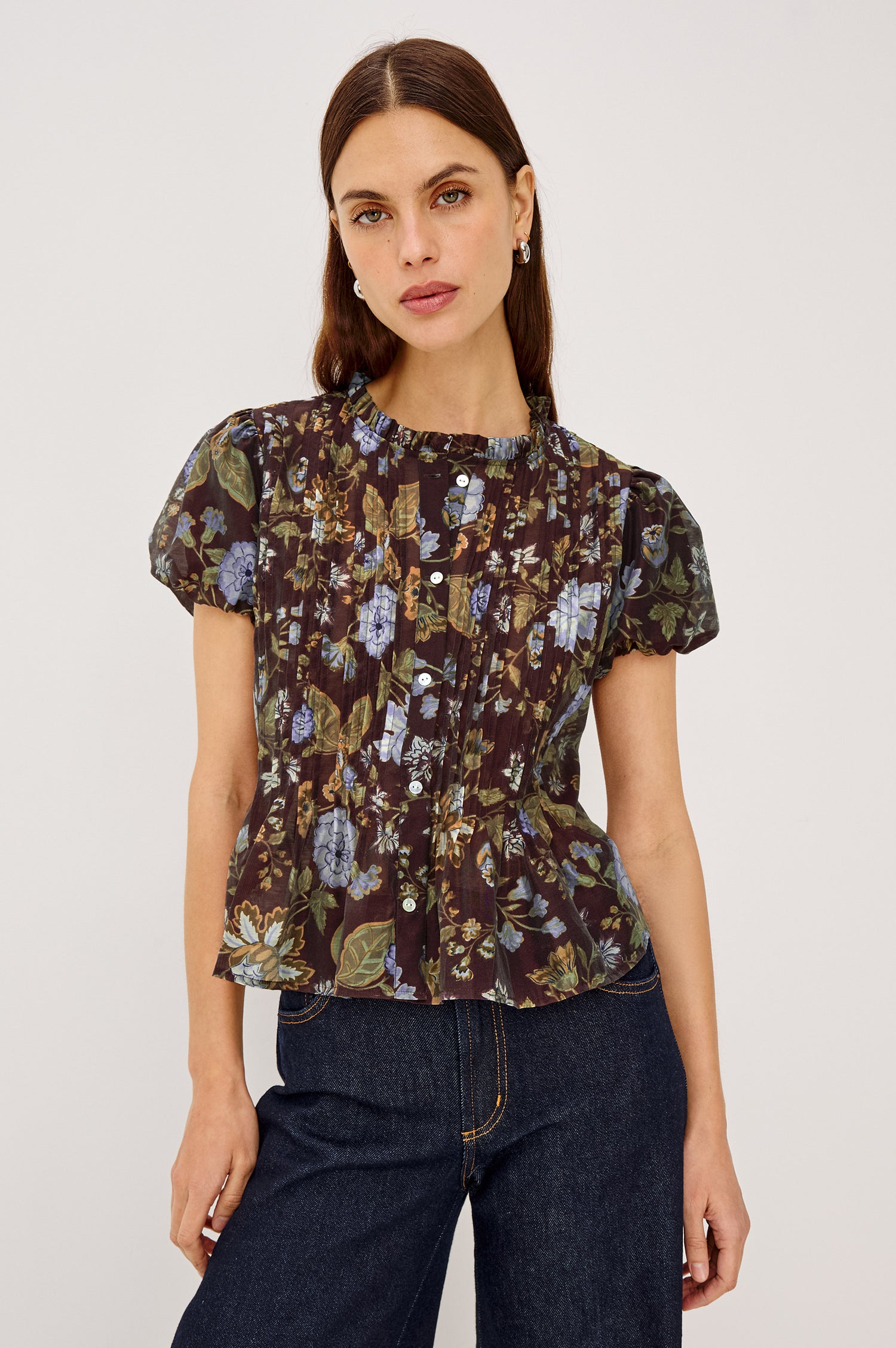 Pepper Shirt in Cotton Poplin With Loose Boxy Fit, Pintuck Detailing, Puff Cap Sleeves, Center-Front Buttons, and Soft Peplum Hem in Willow Colorway - Upper Body Front View Featured on Model