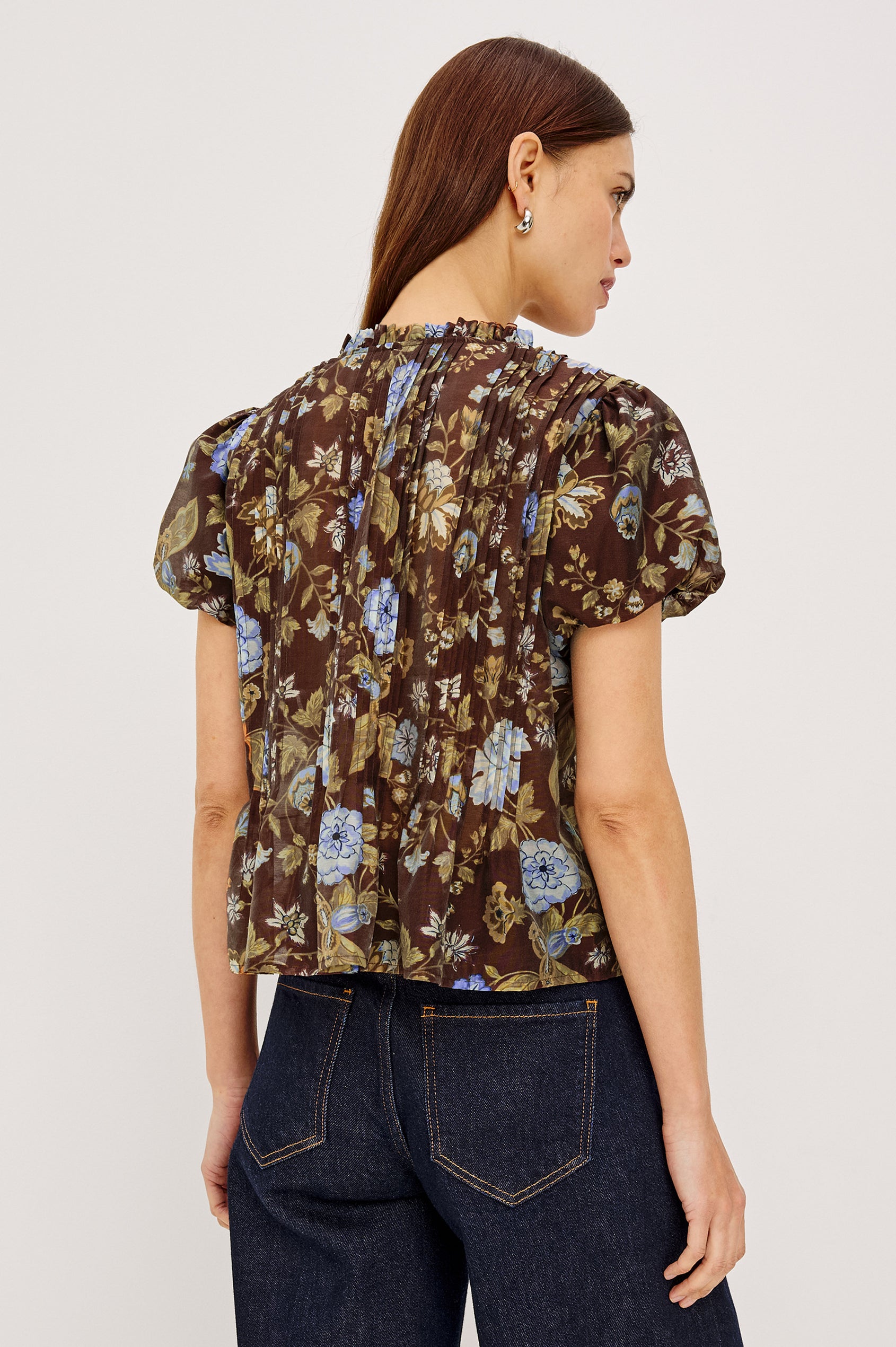Pepper Shirt in Cotton Poplin With Loose Boxy Fit, Pintuck Detailing, Puff Cap Sleeves, Center-Front Buttons, and Soft Peplum Hem in Willow Colorway - Upper Body Back View Featured on Model