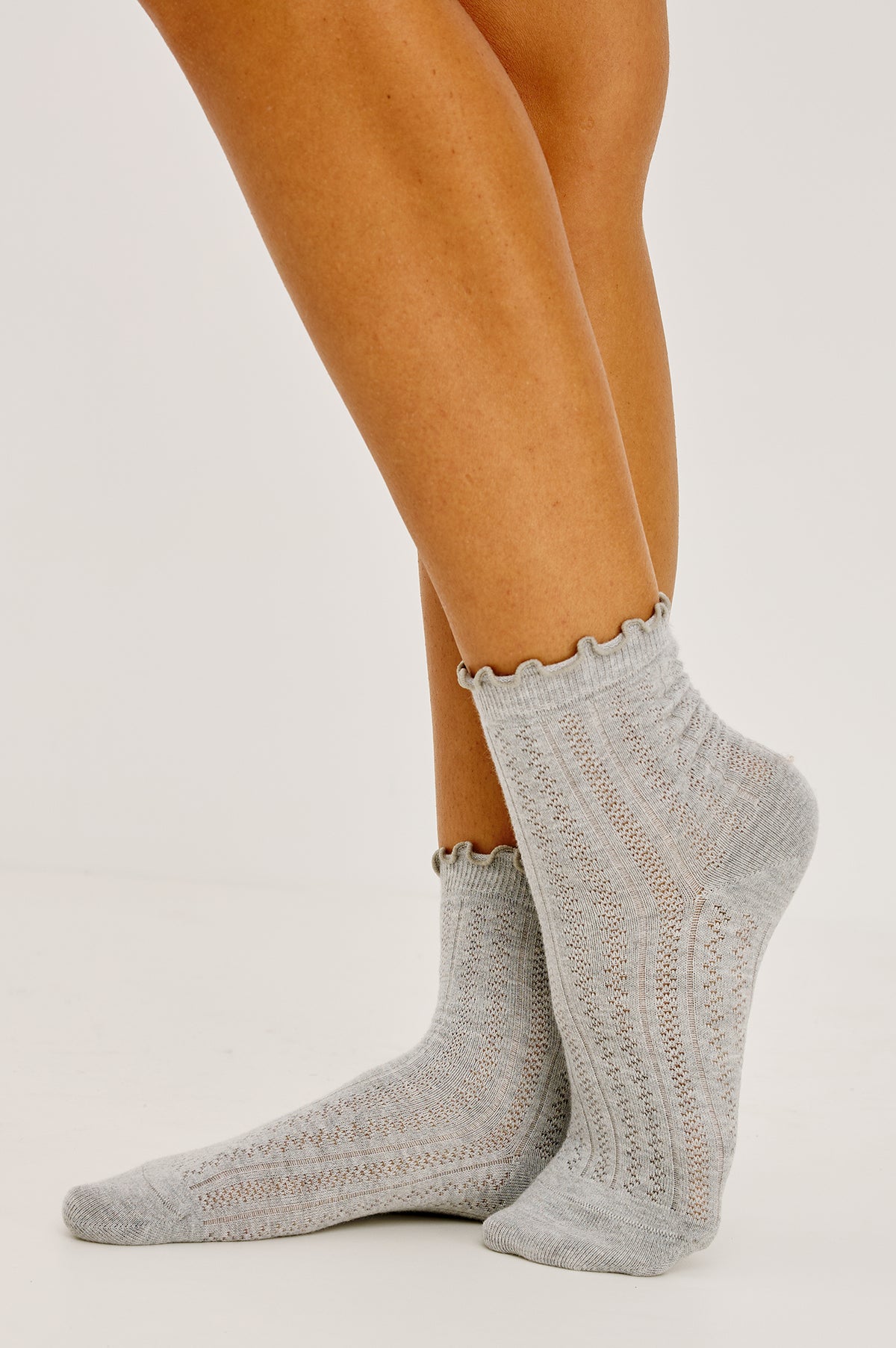Pointelle Crew Socks in Soft Cotton Blend With Ruffle Trim in Heather Grey Colorway - Upper Body Front View Featured on Model.
