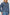 Ports is a soft, lightweight denim shirt with a cropped fit. The shirt features a half placket with snap-front closures, short sleeves, and two chest pockets in Antique Blue Colorway - Close up of Details on model