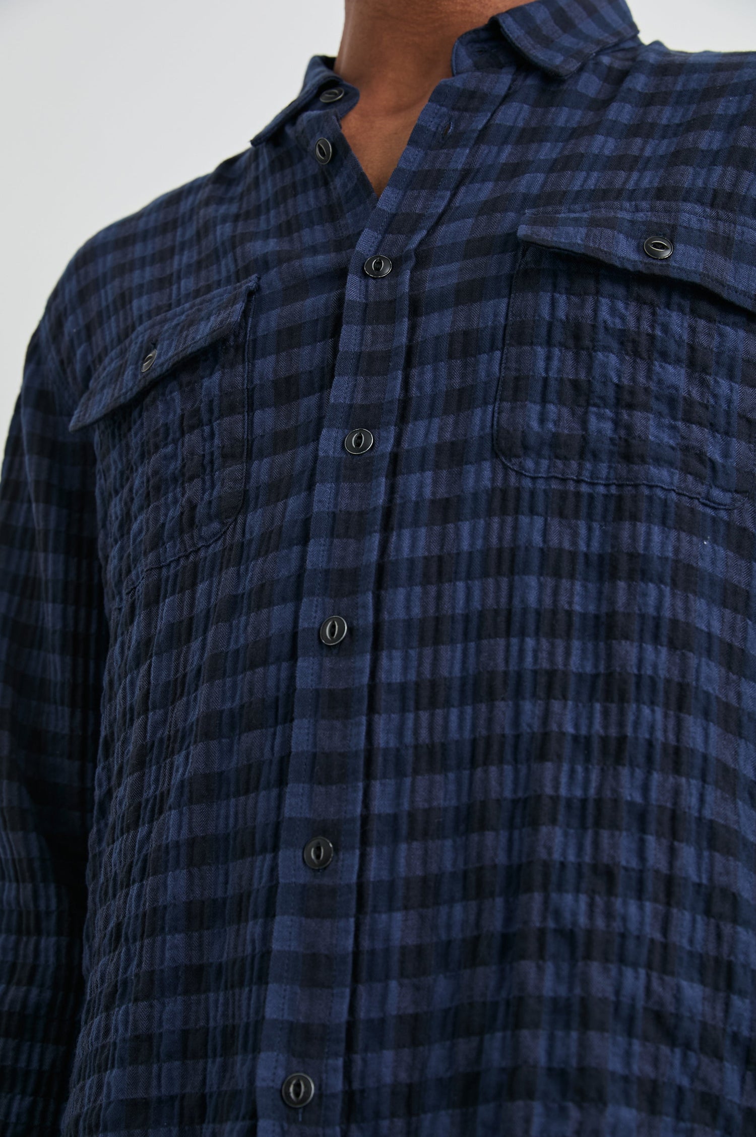Powell Long-Sleeve Button Up with Textured Cotton and Two Chest Buttoned Flap Pockets in Blue Jay Royal Colorway, a Blue and Black plaid - Front View Featured on Model