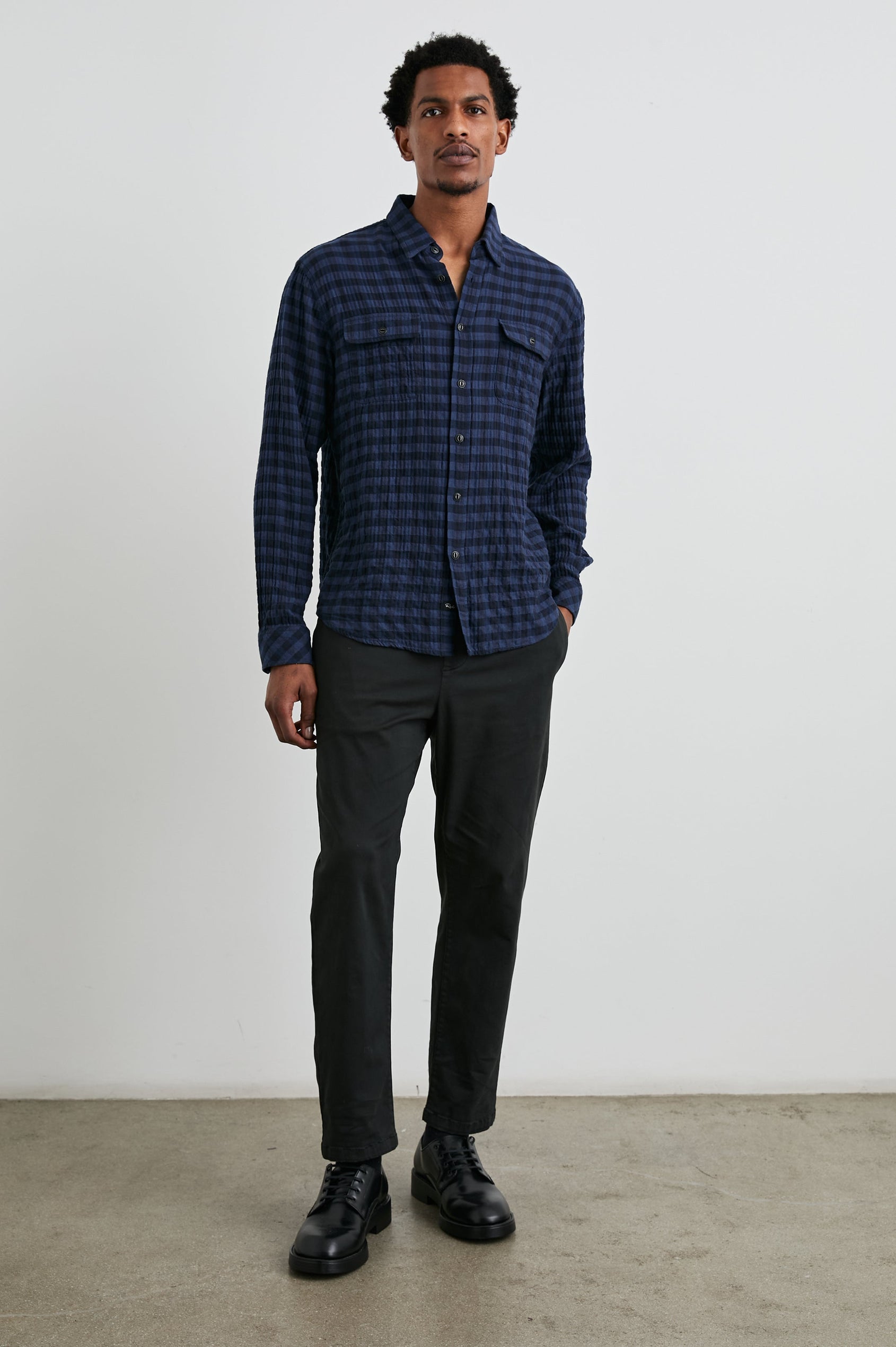 Powell Long-Sleeve Button Up with Textured Cotton and Two Chest Buttoned Flap Pockets in Blue Jay Royal Colorway, a Blue and Black plaid - Front Full Body View Featured on Model