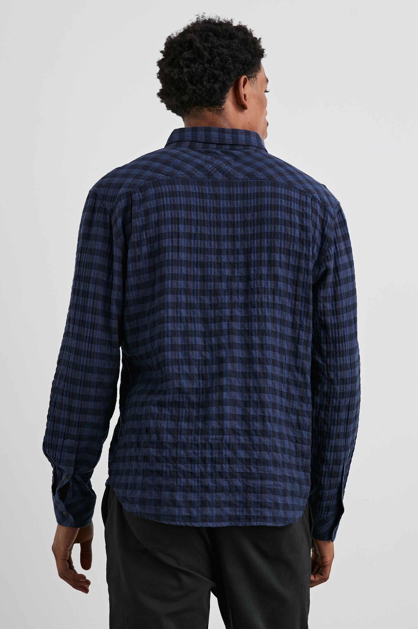 Powell Long-Sleeve Button Up with Textured Cotton and Two Chest Buttoned Flap Pockets in Blue Jay Royal Colorway, a Blue and Black plaid - Back View Featured on Model