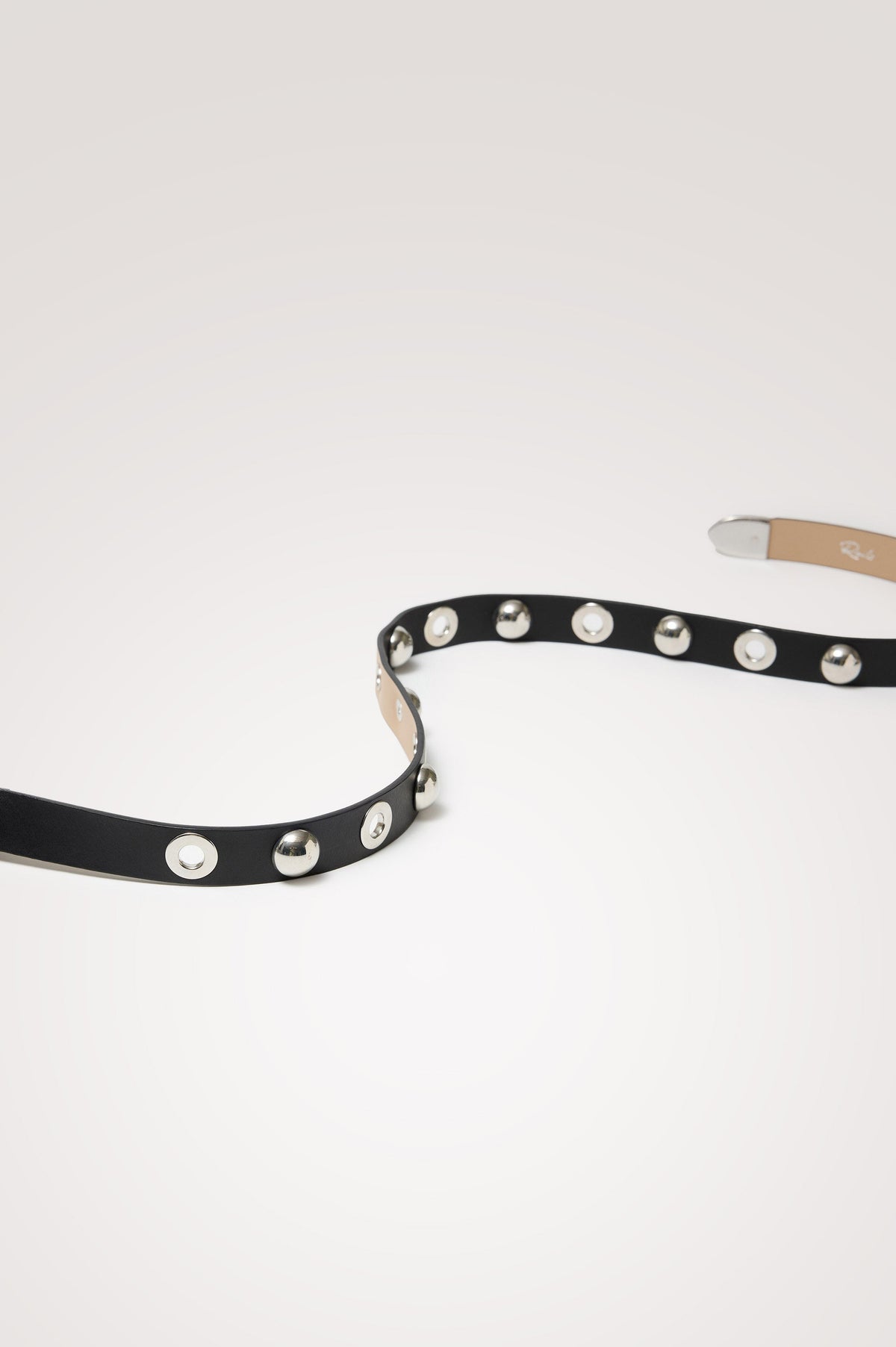 Presley Slim Belt in Leather With Adjustable Buckle and Grommet and Stud Hardware Detailing - Product View Featured