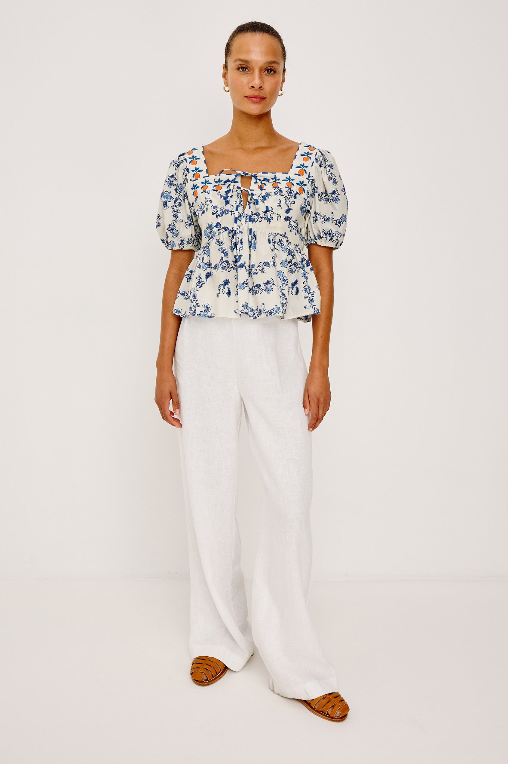 Presley Top in Cotton Poplin With Square Neckline, Short Puff Sleeves, Embroidered Oranges, and Darts for Shaping in Ceramic Floral Colorway - Full Body Front View Featured on Model