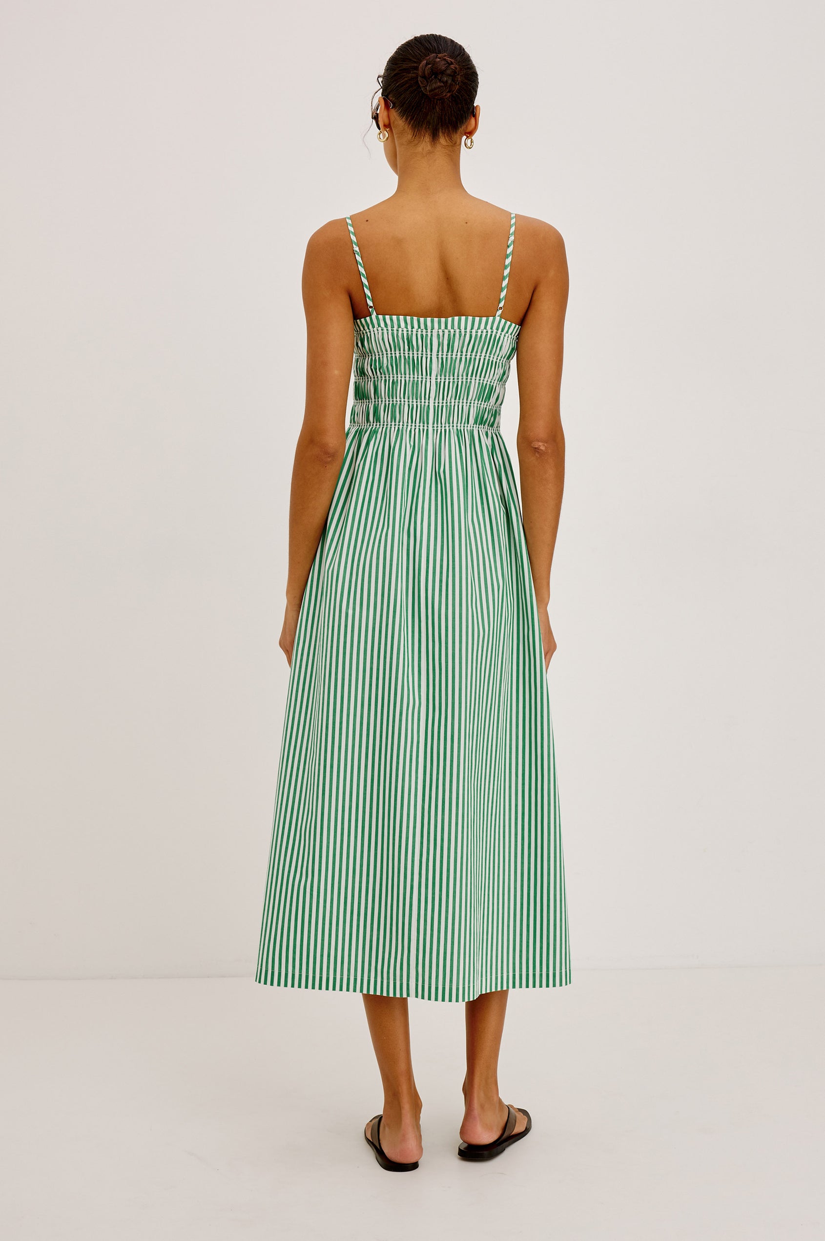 Primrose Maxi Dress in Cotton Poplin With Adjustable Shoulder Straps, Smocked Bodice in Emerald Stripe Colorway - Full Body Back View Featured on Model