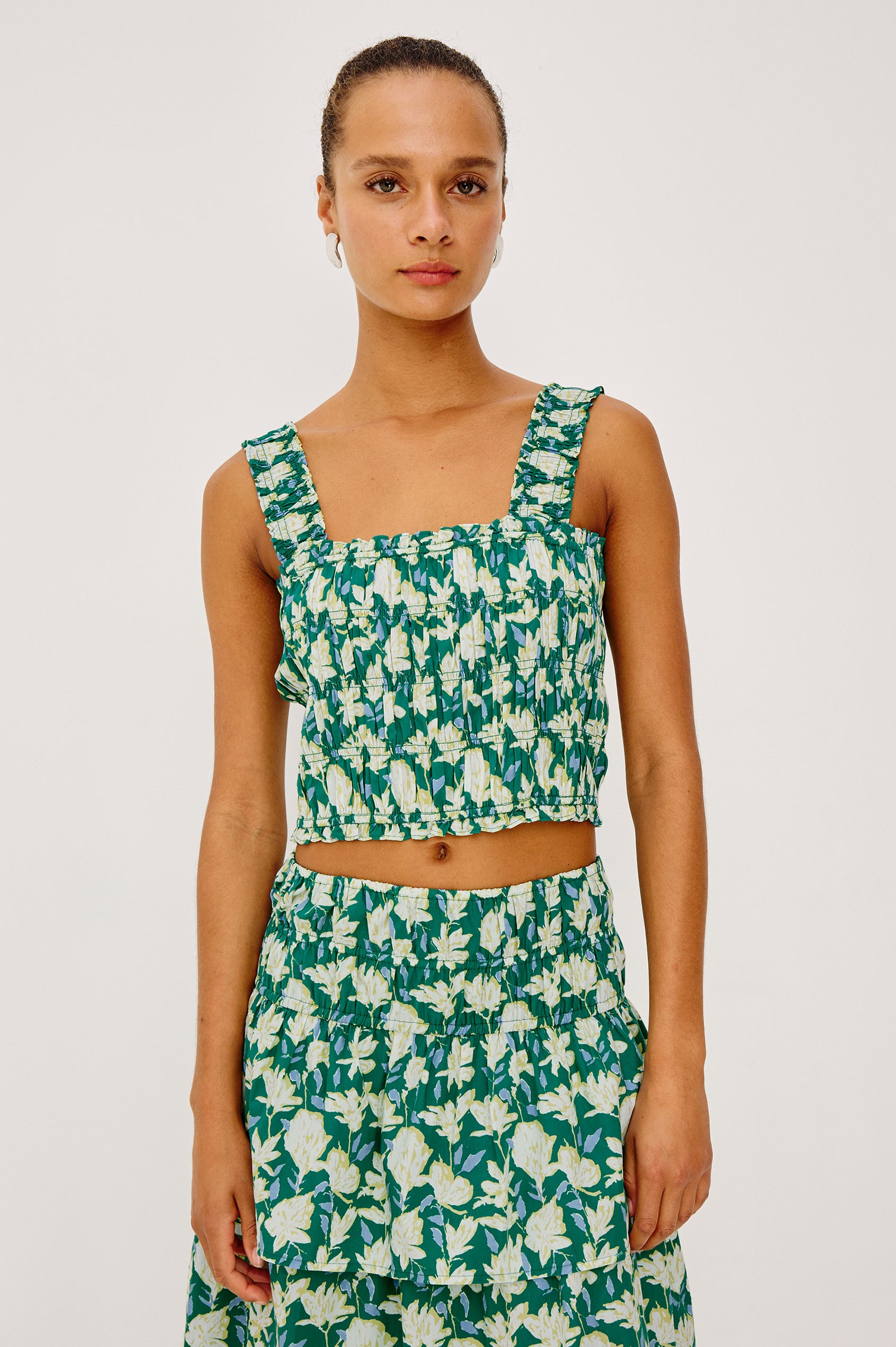 Quinn Cropped Tank Top in Cotton Poplin With Square Neckline, Sand mocked Bodice and Wide Shoulder Straps in Green Mayflower Print - Upper Body Front View Featured on Model