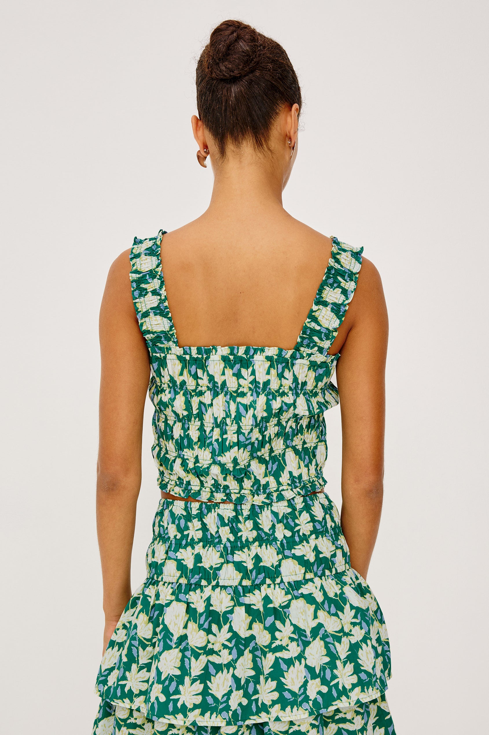 Quinn Cropped Tank Top in Cotton Poplin With Square Neckline, Sand mocked Bodice and Wide Shoulder Straps in Green Mayflower Print - Upper Body Back View Featured on Model