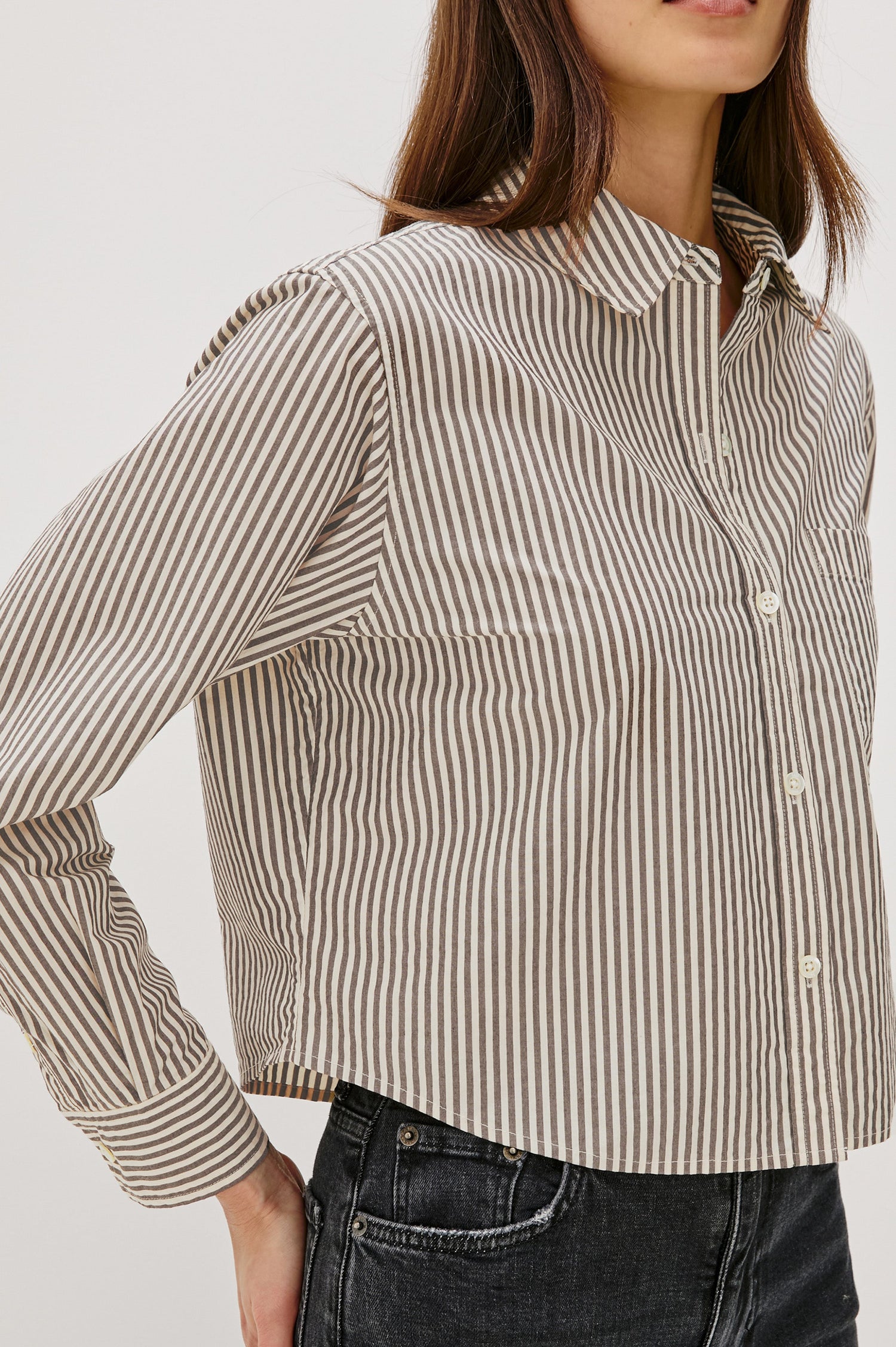 Ramy Long Sleeve Poplin Cotton Shirt With Shortened Hem In Colorway Noir Stripe - Close Up View Featured On Model