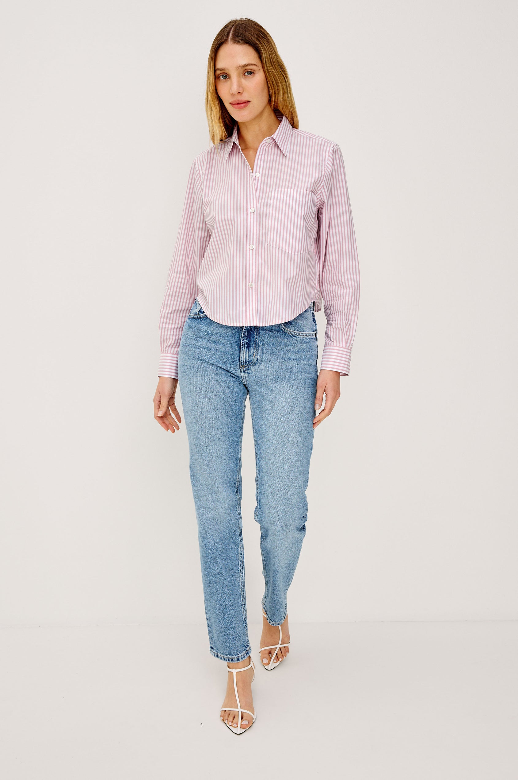 Ramy Cropped Button-Up Shirt in Cotton Poplin With Collar, Front Buttons, and Long Sleeves in Rose Stripe Colorway - Full Body Front View Featured on Model