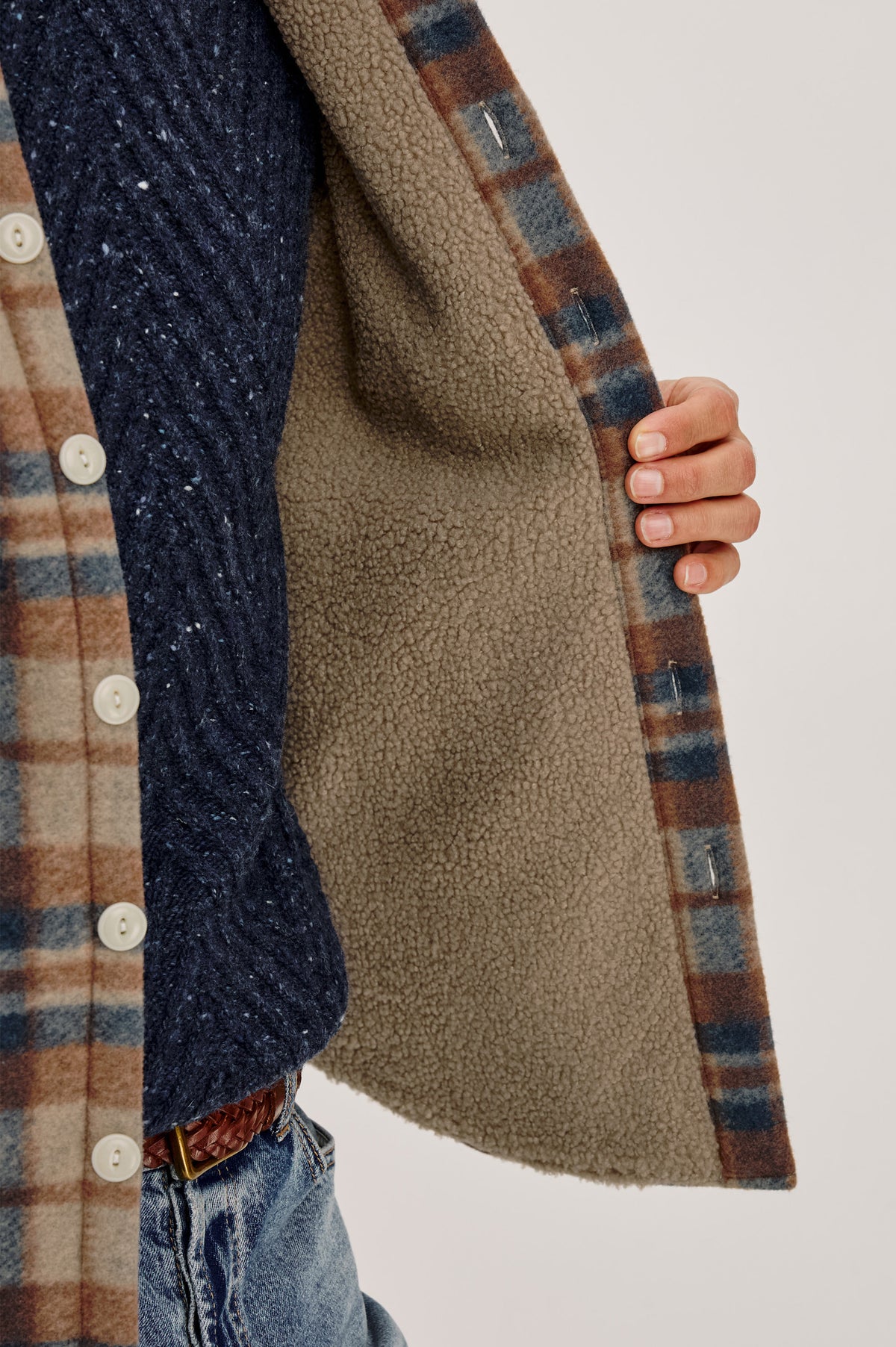 Ranger Jacket With Brushed Poly Outer Shell, Vegan Sherpa Lining, Quilted Long Sleeves, Point Collar, and Front Buttons in Robin Oat Colorway - Upper Body Front Detail View Featured on Model.