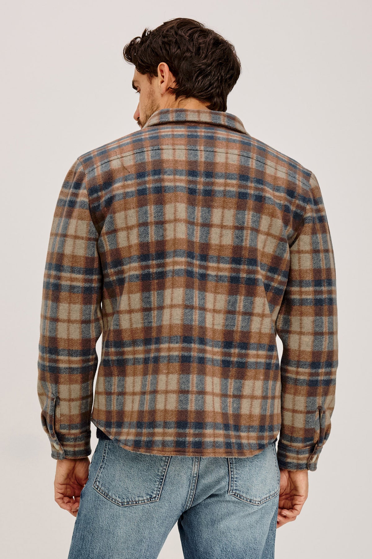 Ranger Jacket With Brushed Poly Outer Shell, Vegan Sherpa Lining, Quilted Long Sleeves, Point Collar, and Front Buttons in Robin Oat Colorway - Upper Body Back View Featured on Model.