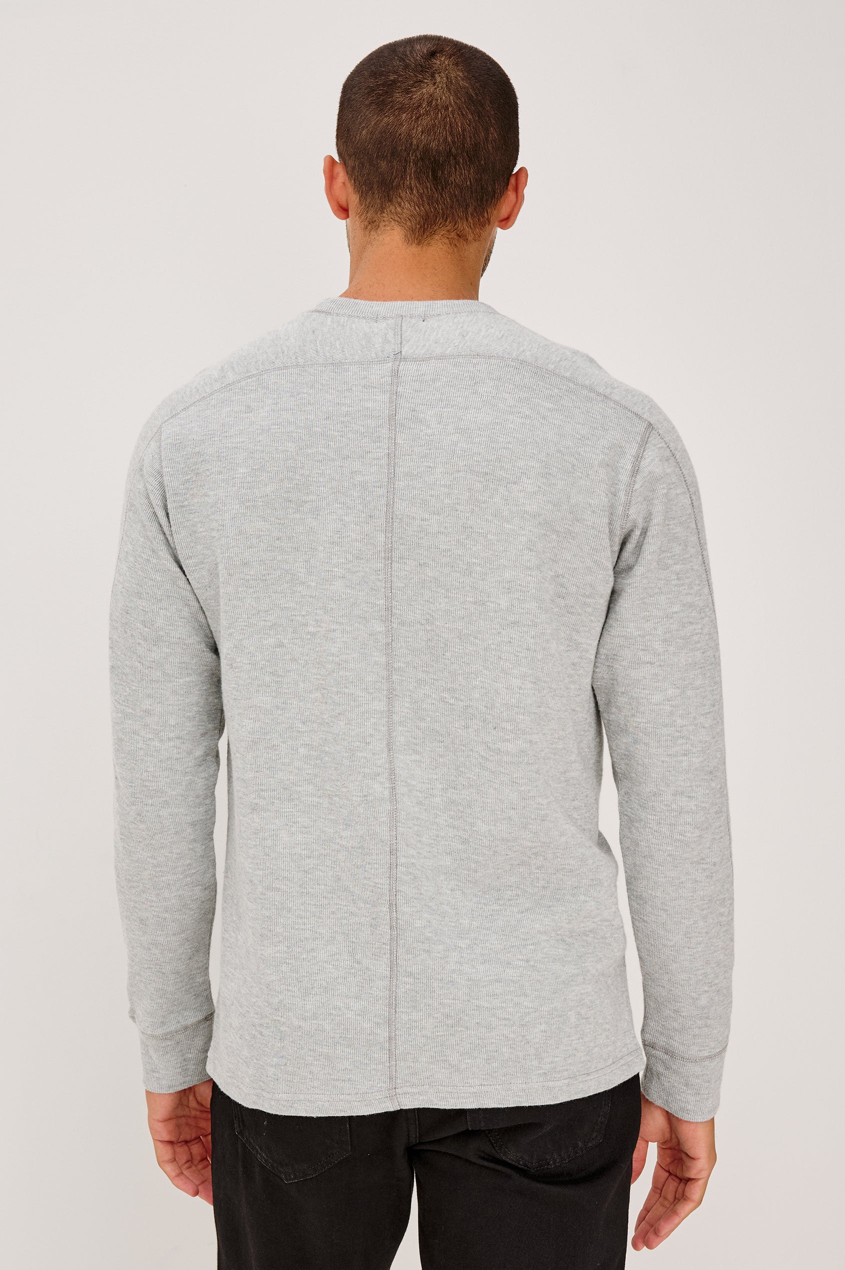 Rheese Long Sleeve Tee in French Rib Cotton With Crew Neckline, Classic Fit, and Seam Detailing in Grey Heather Colorway - Upper Body Back View Featured on Model