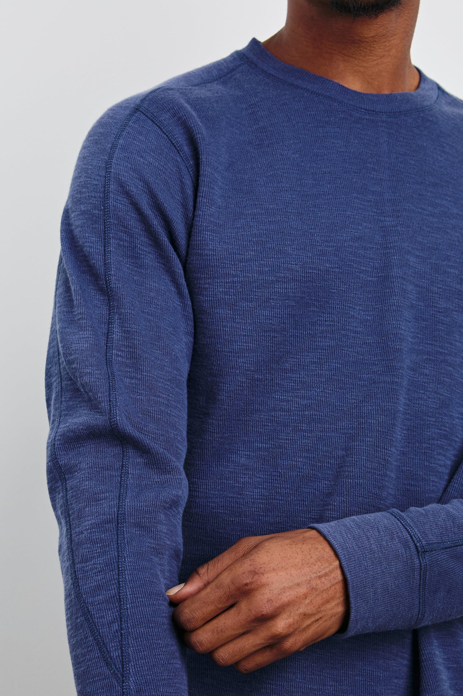 Rheese Long-Sleeve Thermal with Crew Neck and Statement Seams on Sleeves and Back in Vintage Indigo Colorway - Front View Featured on Model