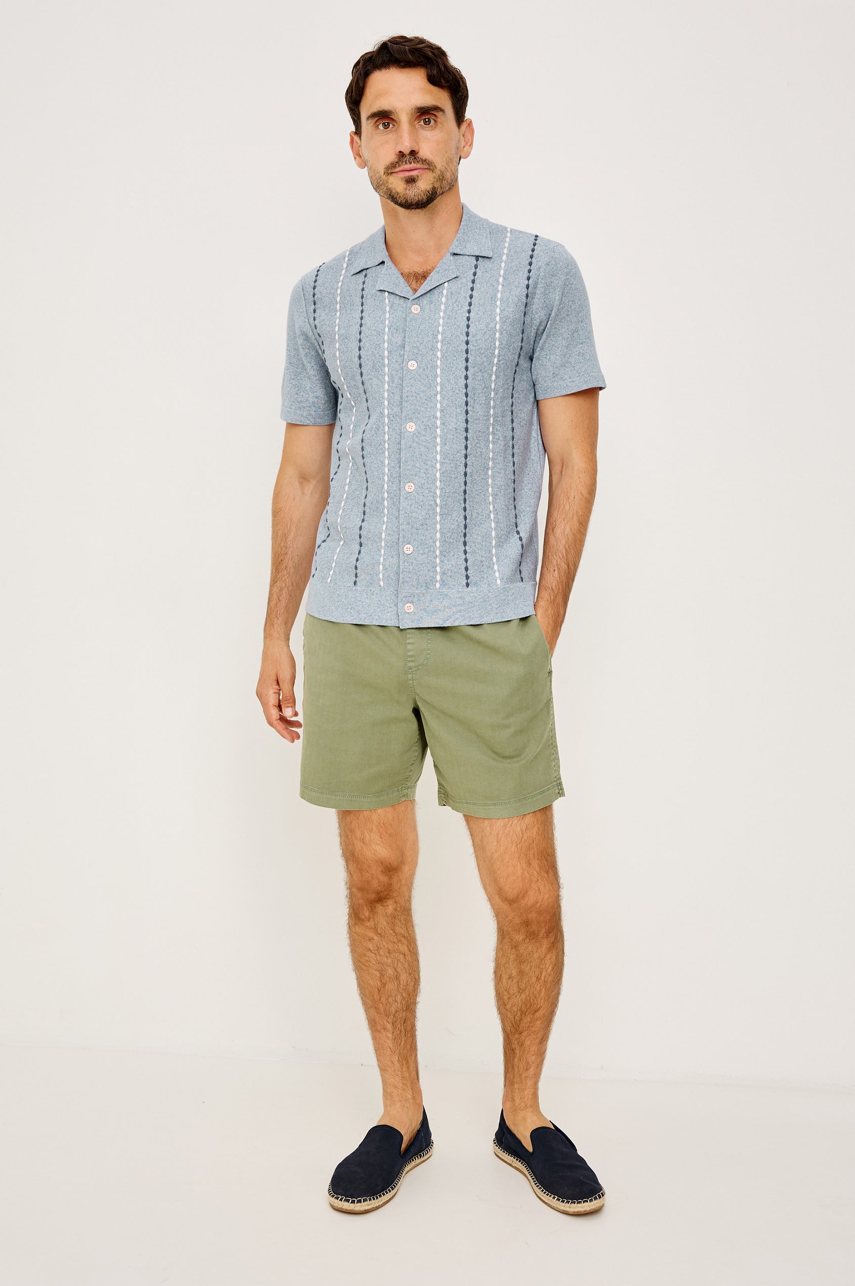 Richie Polo Shirt in Cotton Blend Knit With Collar, Front Buttons, Short Sleeves, and Classic Fit in Navy White Sky Colorway - Full Body Front View Featured on Model