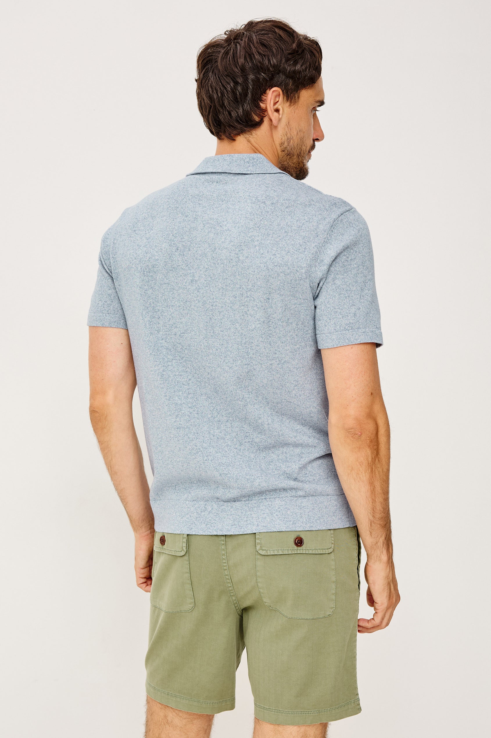 Richie Polo Shirt in Cotton Blend Knit With Collar, Front Buttons, Short Sleeves, and Classic Fit in Navy White Sky Colorway - Upper Body Back View Featured on Model