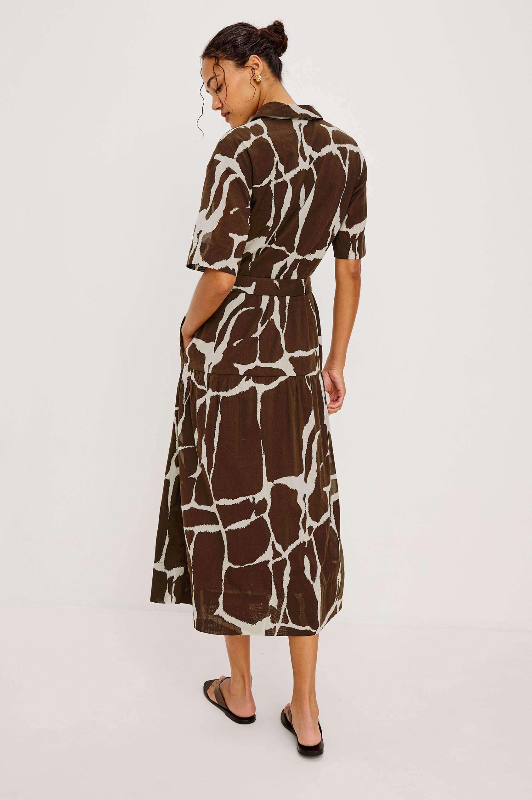 Richmond Midi Dress in Cotton With Collar Front Button Placket Side Pockets D-Ring Waist Belt Short Sleeves and Relaxed Fit in Terra Colorway - Full Body Back View Featured on Model
