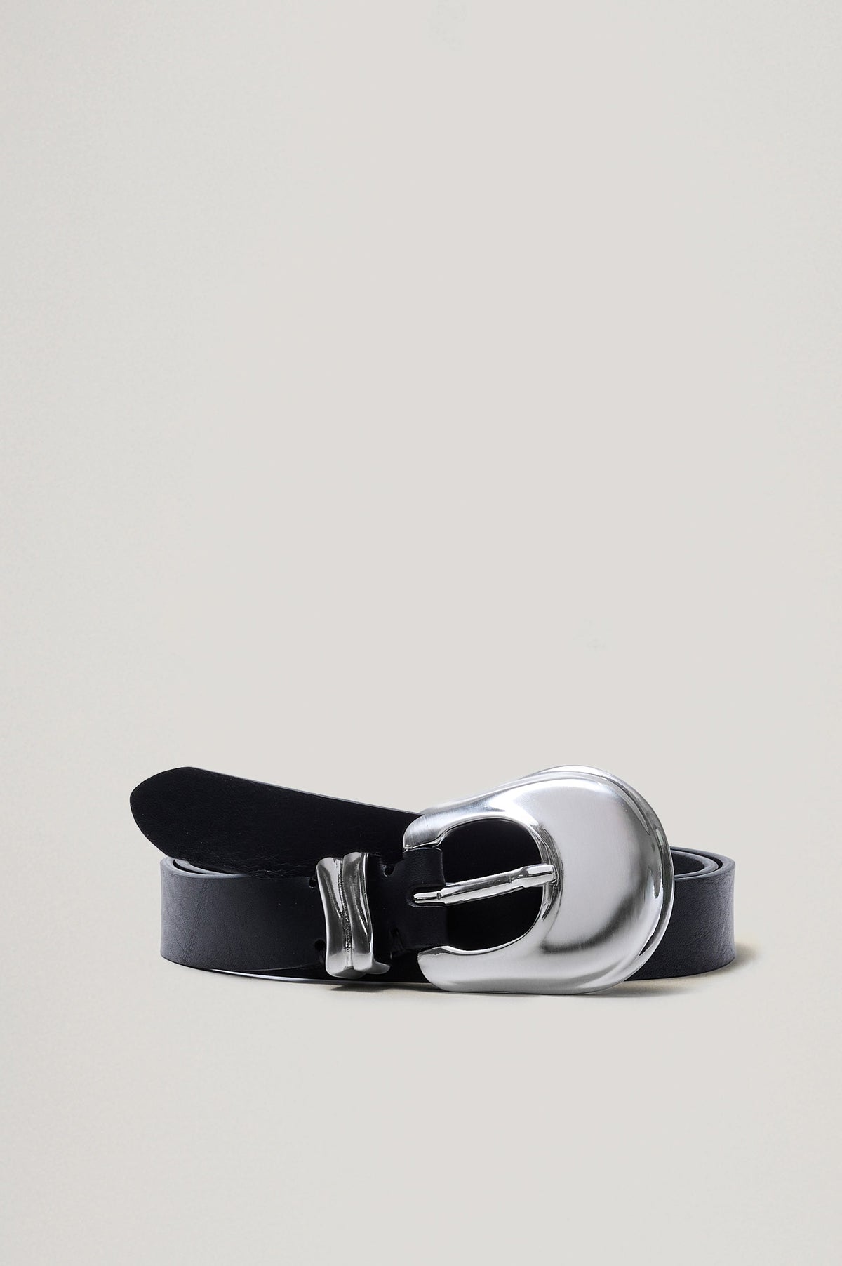 Rodeo black leather belt featuring a western-style engraved silver buckle and hardware. Front view of belt featured not on model.