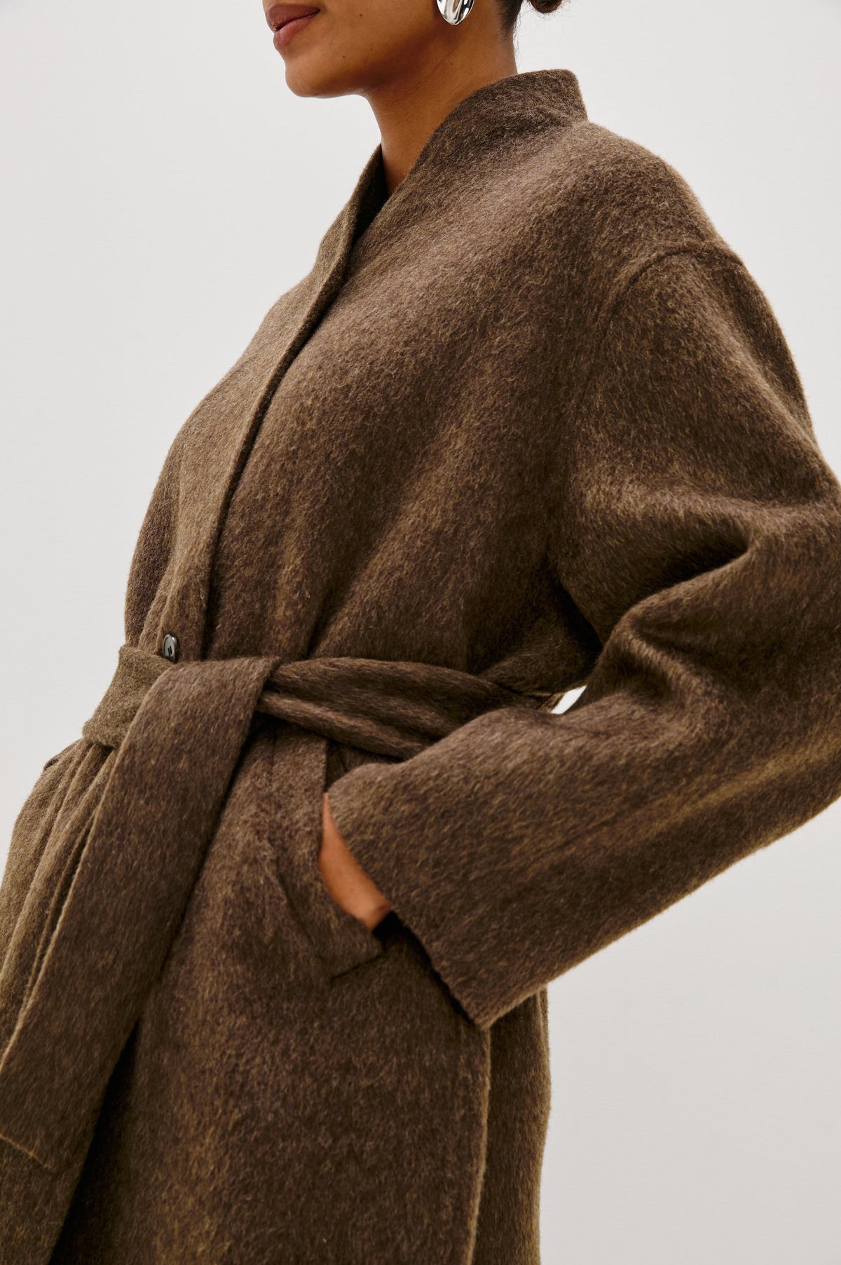 Roland Wool Blend Coat with a Funnel Collar, Self-Tie Belt, and A-Line Fit in Heather Umber Colorway - Side Crop Detail View Shown on Model.