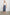 Rosetta Midi Skirt with White Buttons Down the Front in Navy Flora Colorway, with flowers in blues and peaches on navy - Front Full Body View Featured on Model 