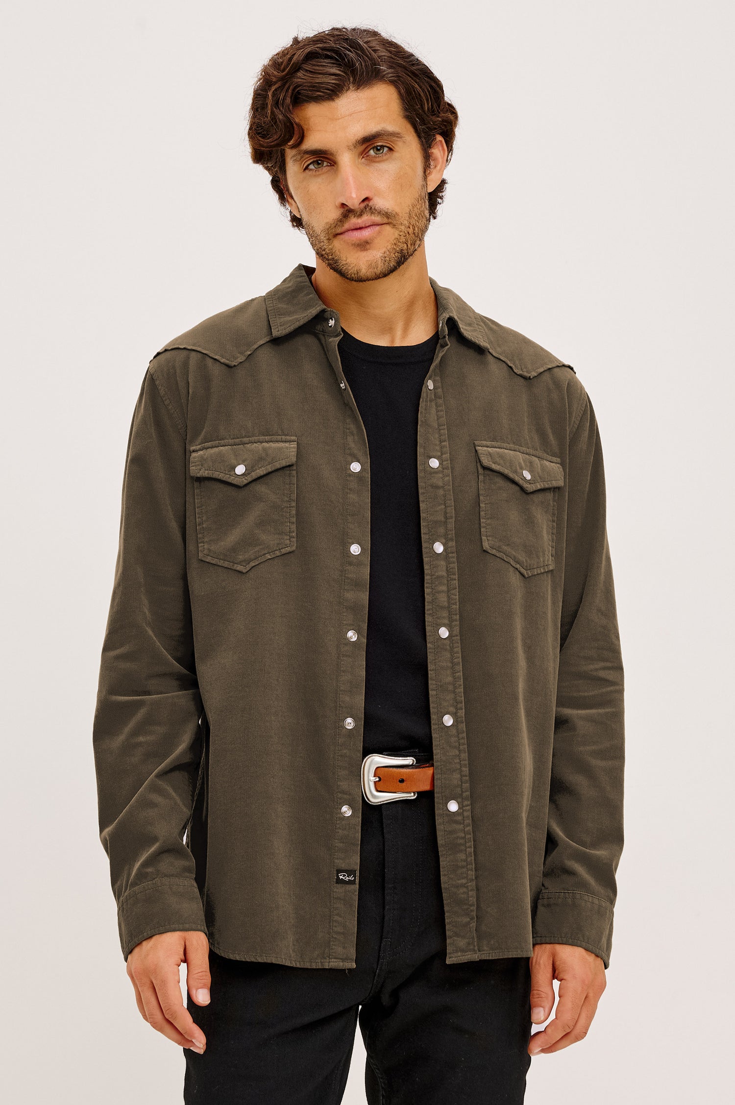 Roy Shirt in Fine Wale Corduroy With Western Shoulder and Back Yokes, Spread Collar, Snap Front, Dual Chest Flap Pockets, and Shirttail Hem in Acacia Colorway - Upper Body Front View Featured on Model