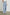 Ryan high rise linen pant with shirred waist and drawstring in light wash Faded Indigo- front view on model, hand in pocket